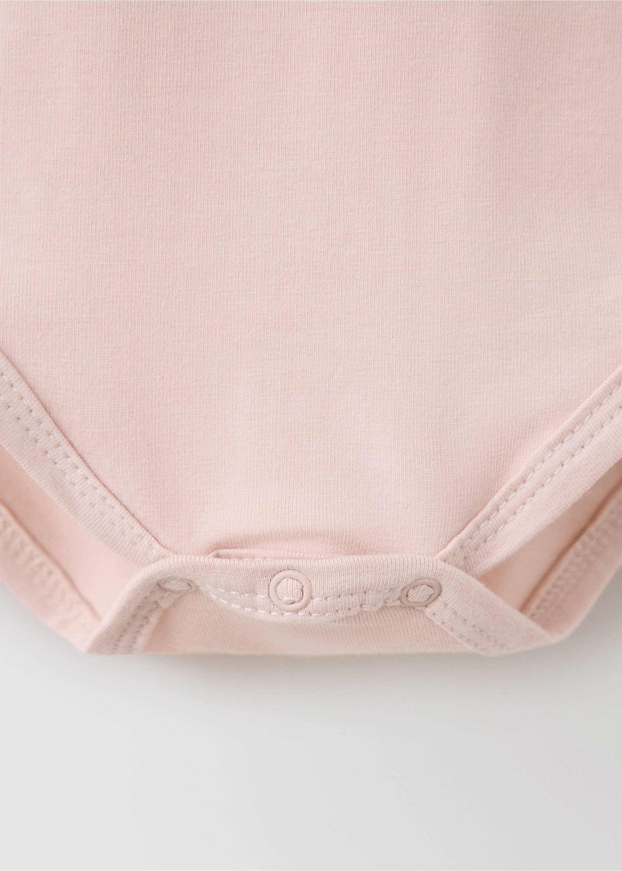 Pale pink baby pyjama bodysuit snap-button detail, Red. Ref: 37038639-00.