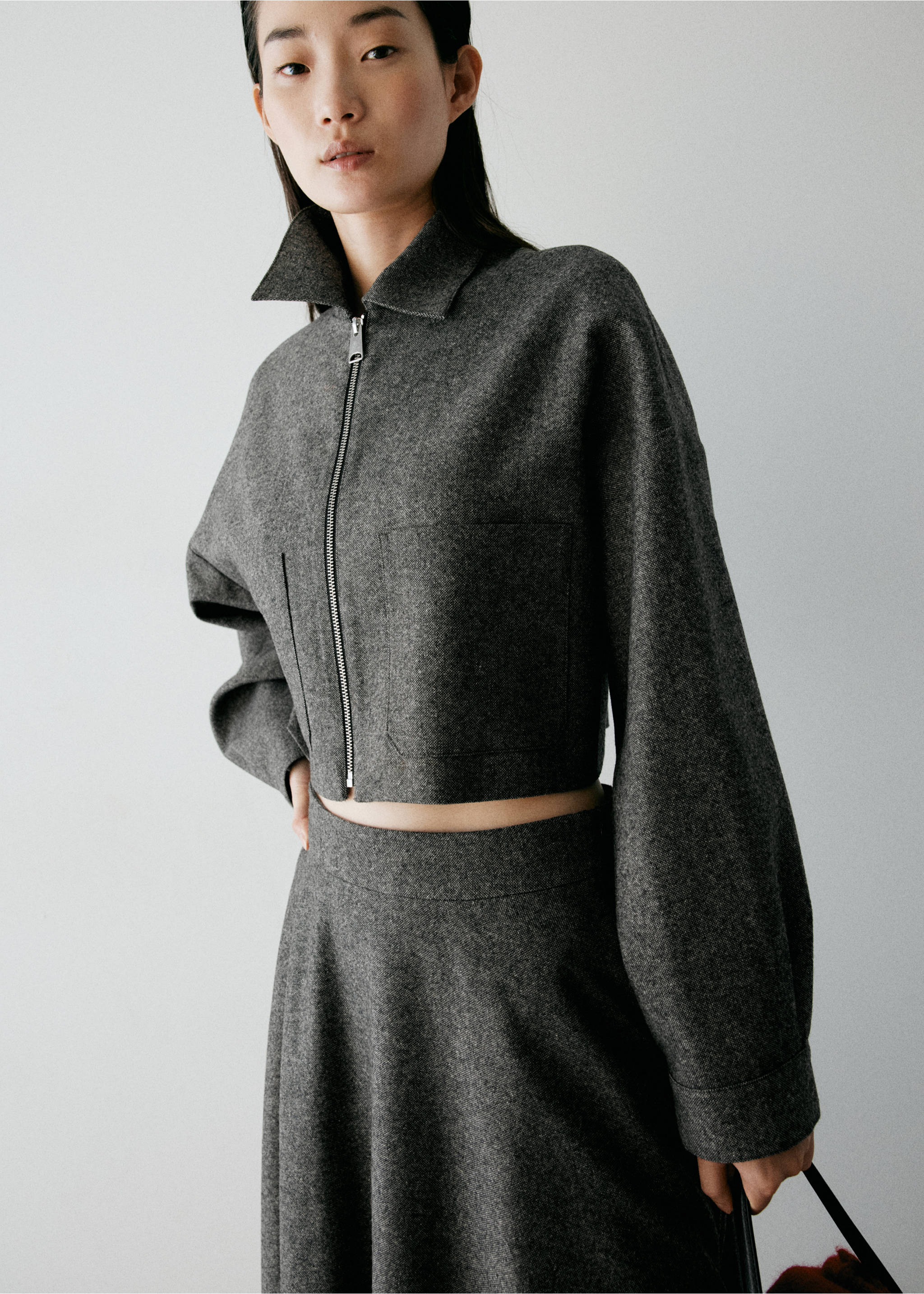 Dark grey cropped jacket with a pointed collar and full zip., Black. Ref: 37038642-00.