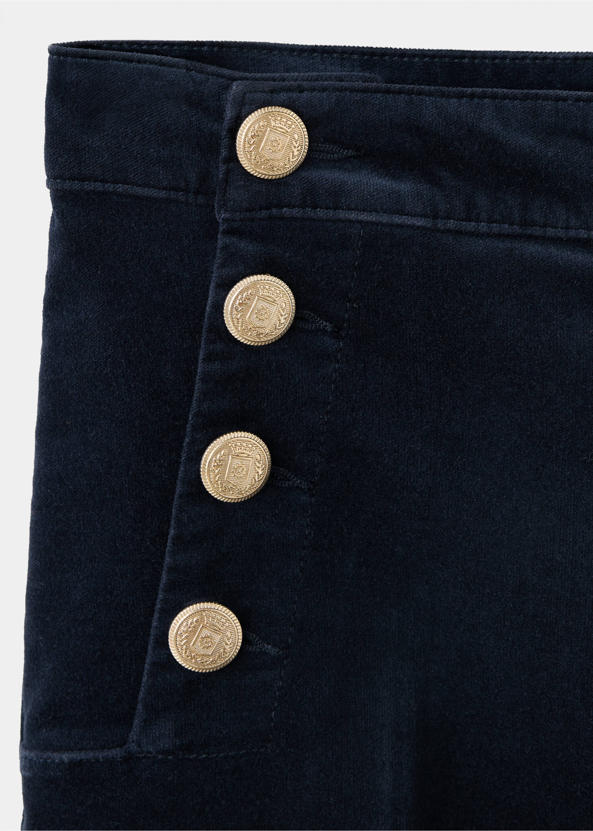 Close-up of navy blue denim trousers featuring embossed gold buttons., Blue. Ref: 37039117-00.