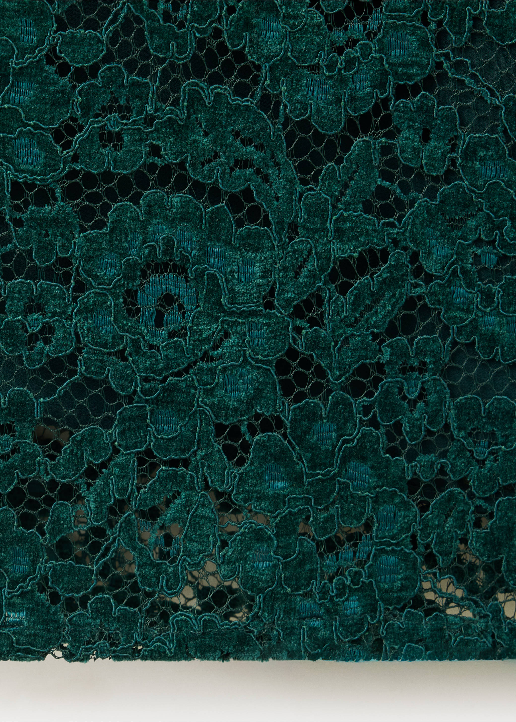 Close-up of the dark green floral lace fabric of a dress., Dark Green. Ref: 37039123-00.