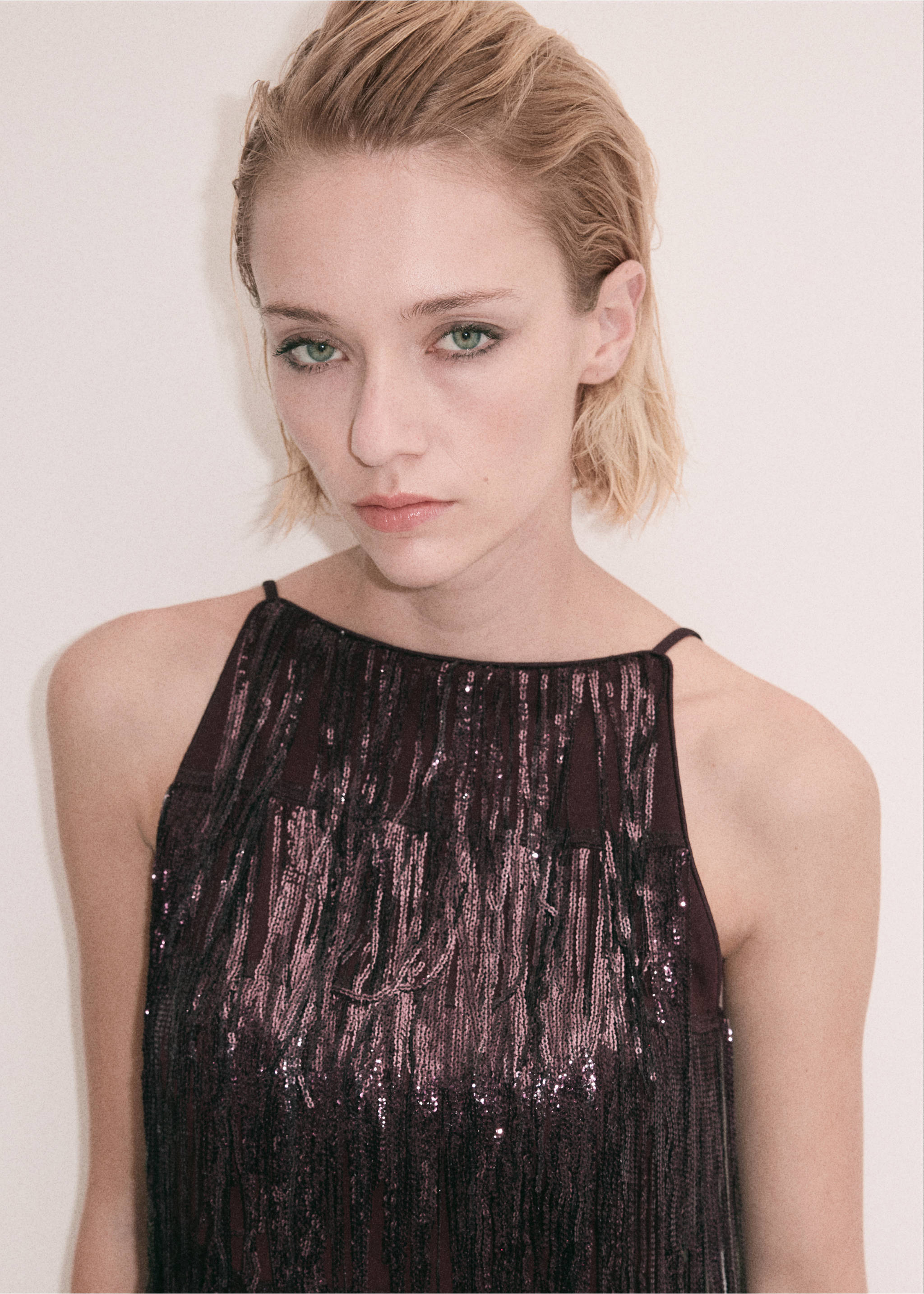 Close-up of a dark plum sequinned halter top with thin straps., Burgundy. Ref: 37039125-00.