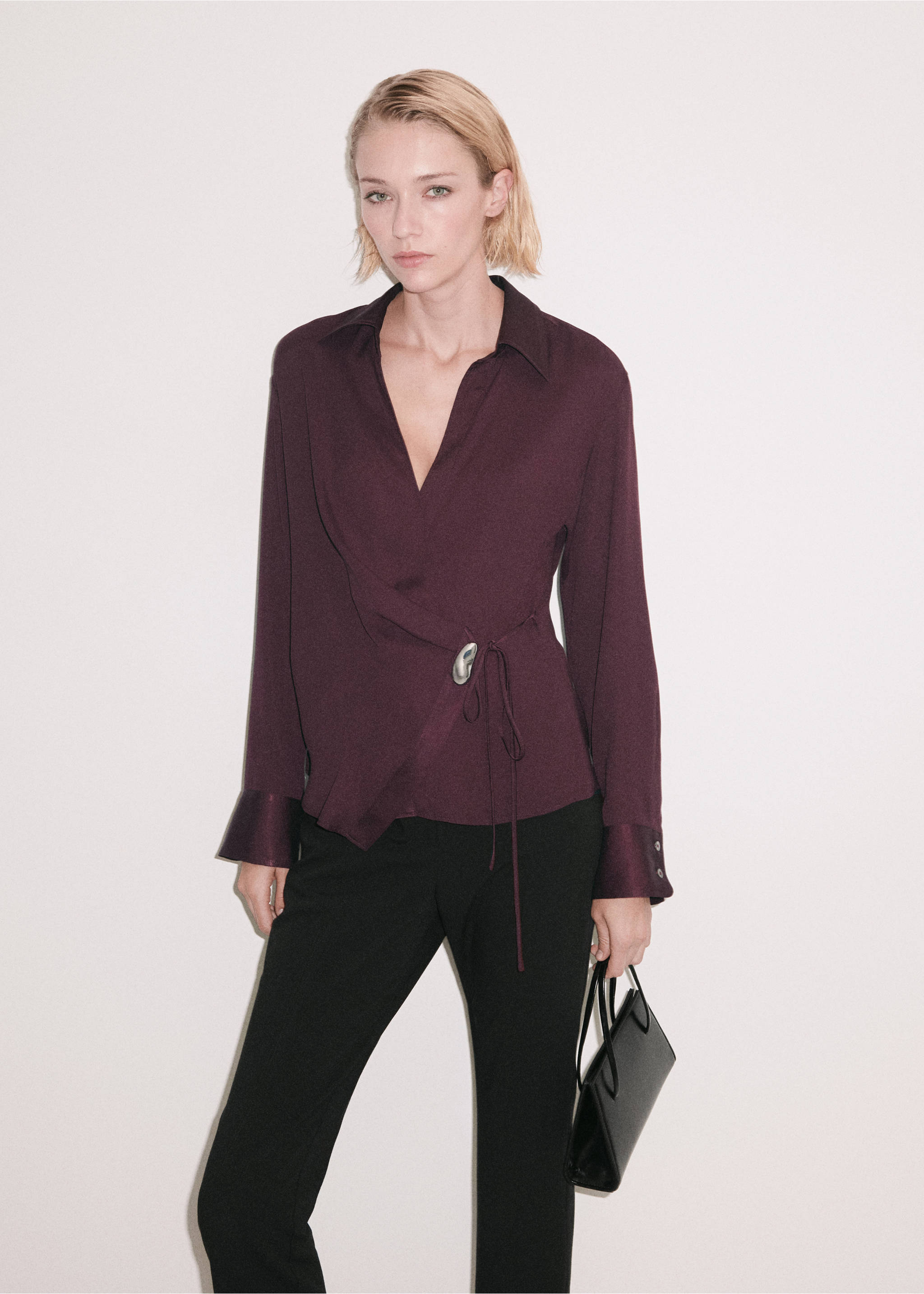 Dark plum wrap shirt with an oval buckle, long sleeves, and collar., Burgundy. Ref: 37039130-00.