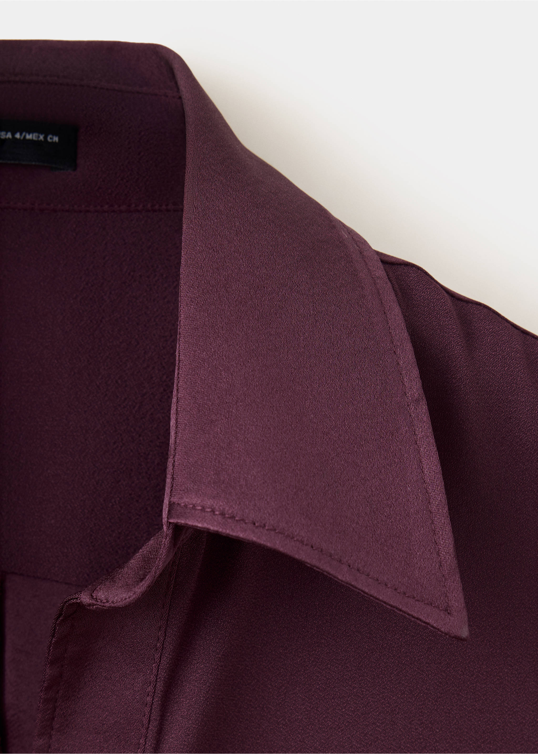 Plum shirt collar close-up with topstitching detail., Burgundy. Ref: 37039130-00.