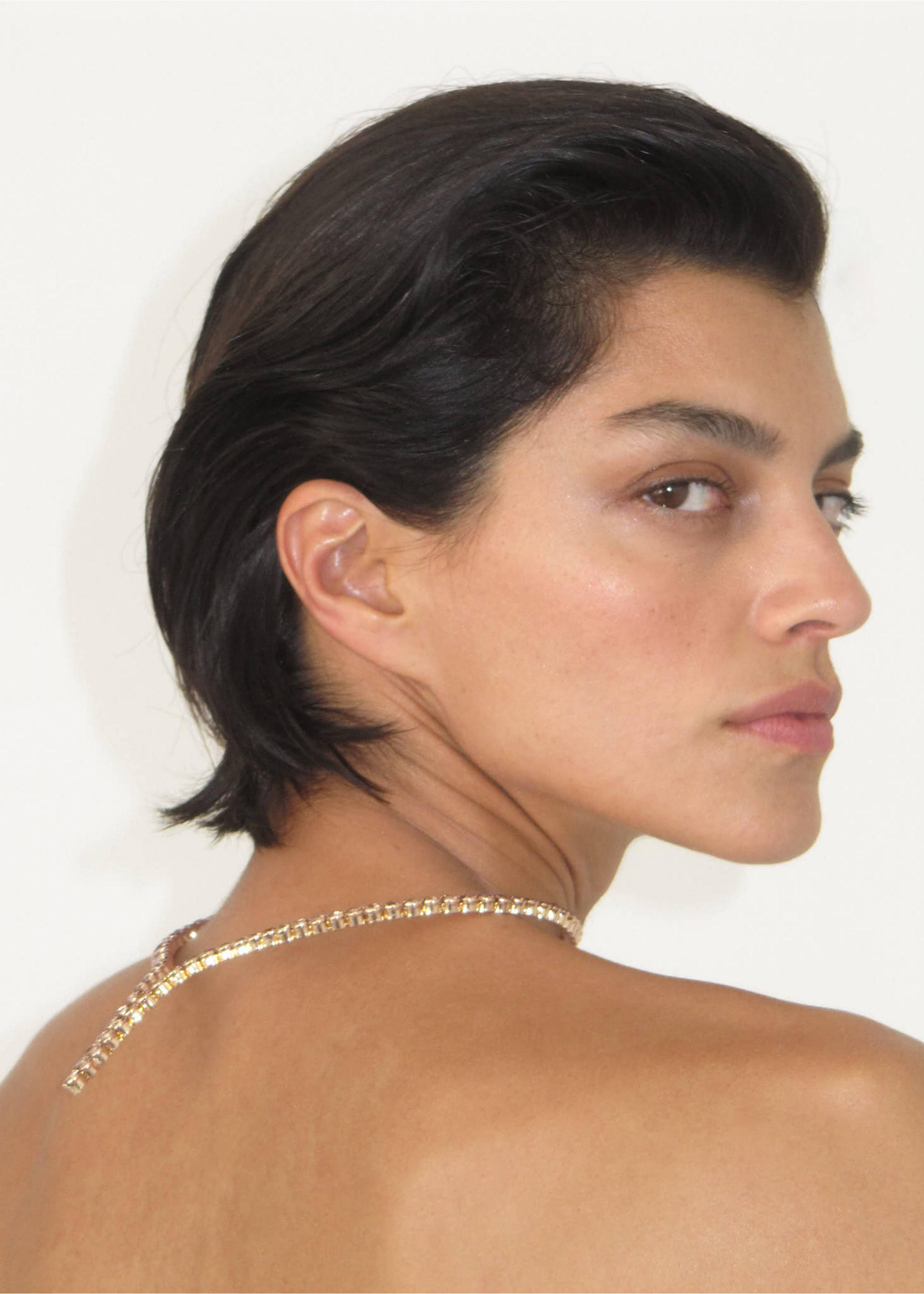 Metallic gold rhinestone-encrusted collar necklace worn on a model., Gold. Ref: 37039137-00.