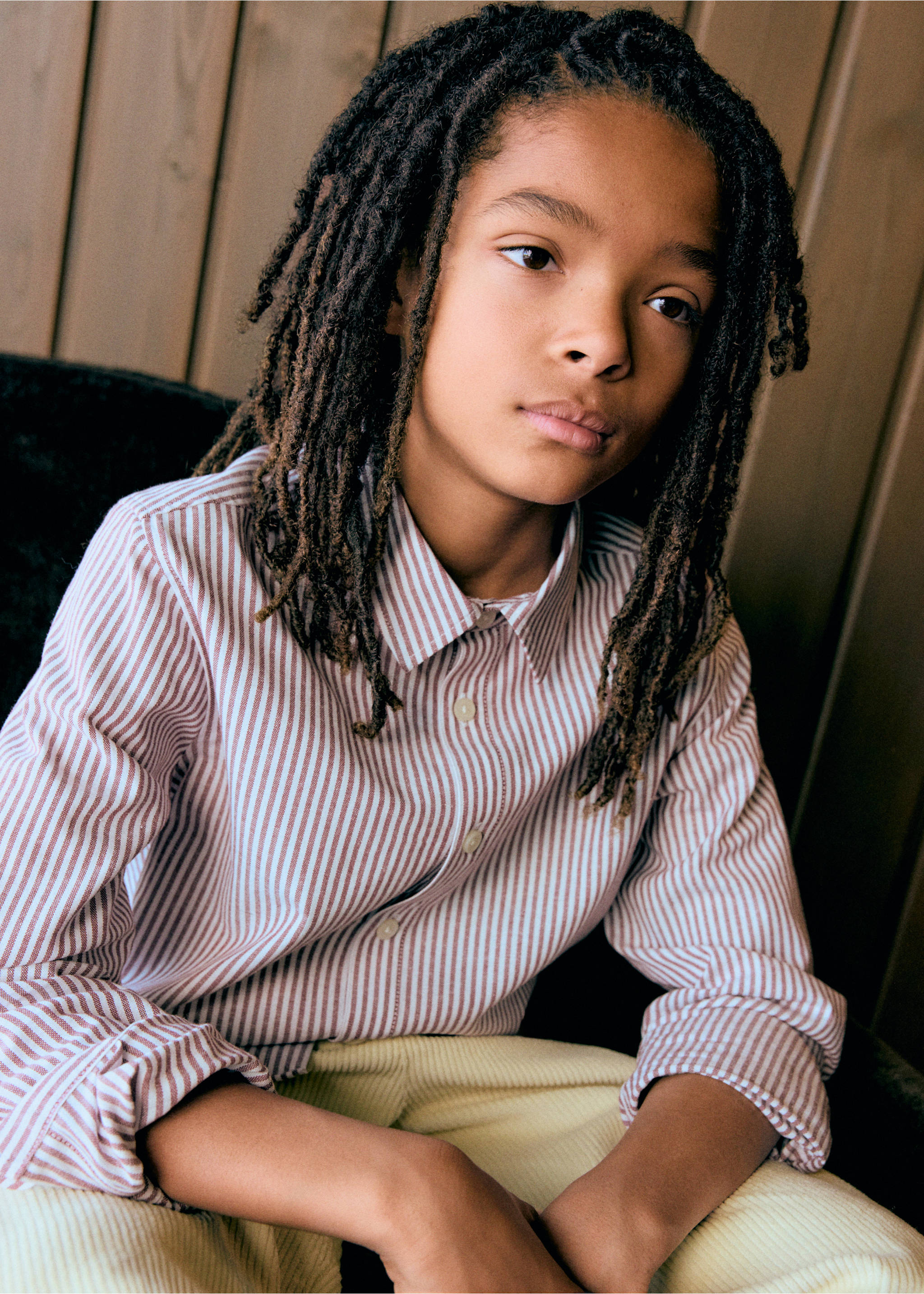Brown and white striped long-sleeved shirt with a classic collar and front buttons.