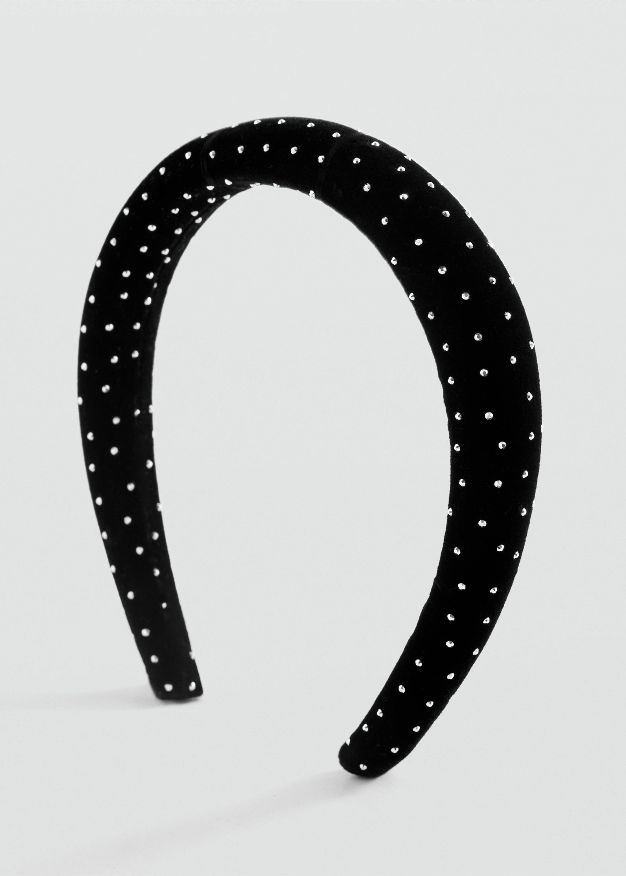 Black velvet headband with silver studs in a three-quarters view., Black. Ref: 37039215-00.