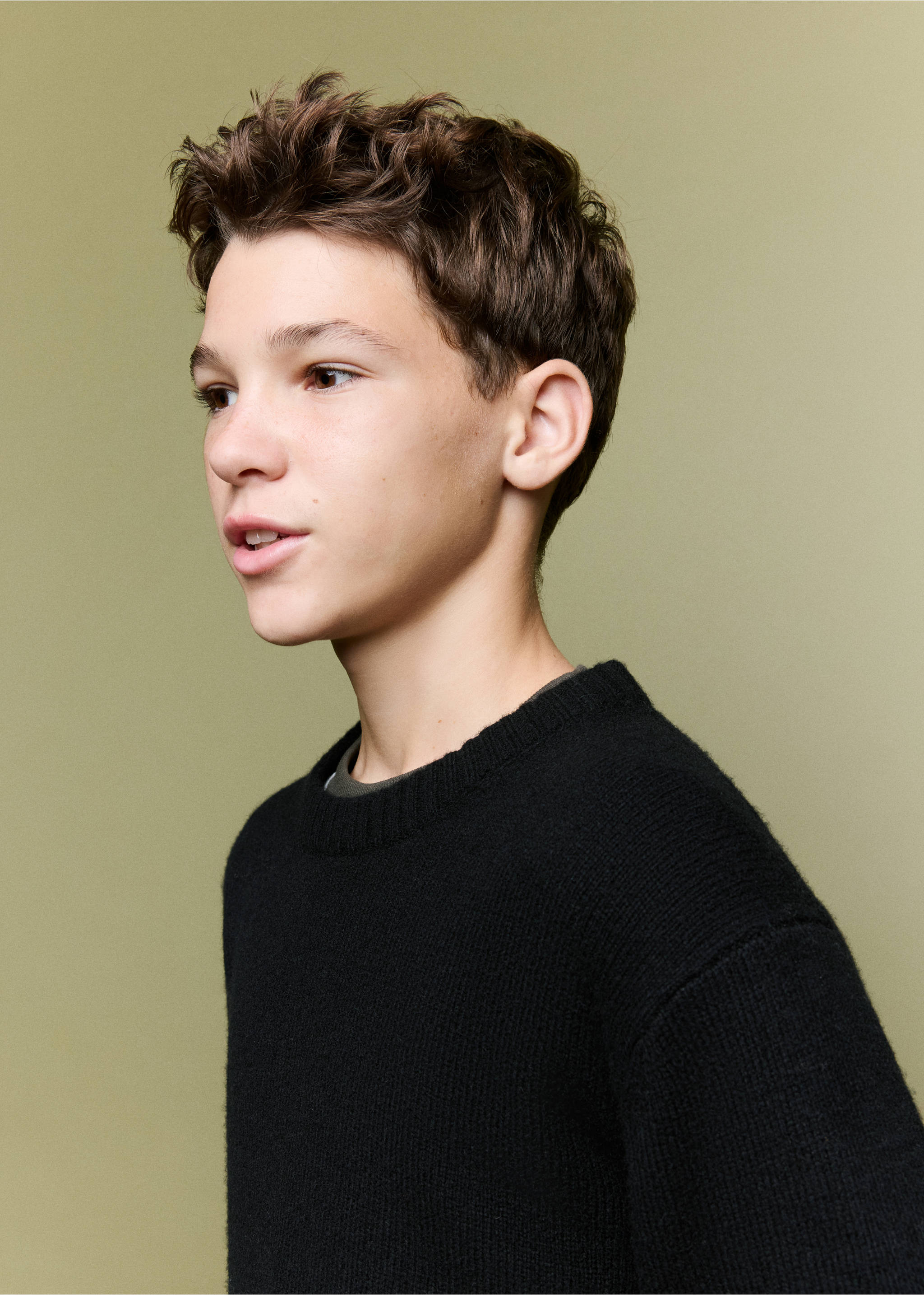 Black knit jumper with a ribbed round neckline, shown in a close-up., Black. Ref: 37039227-00.