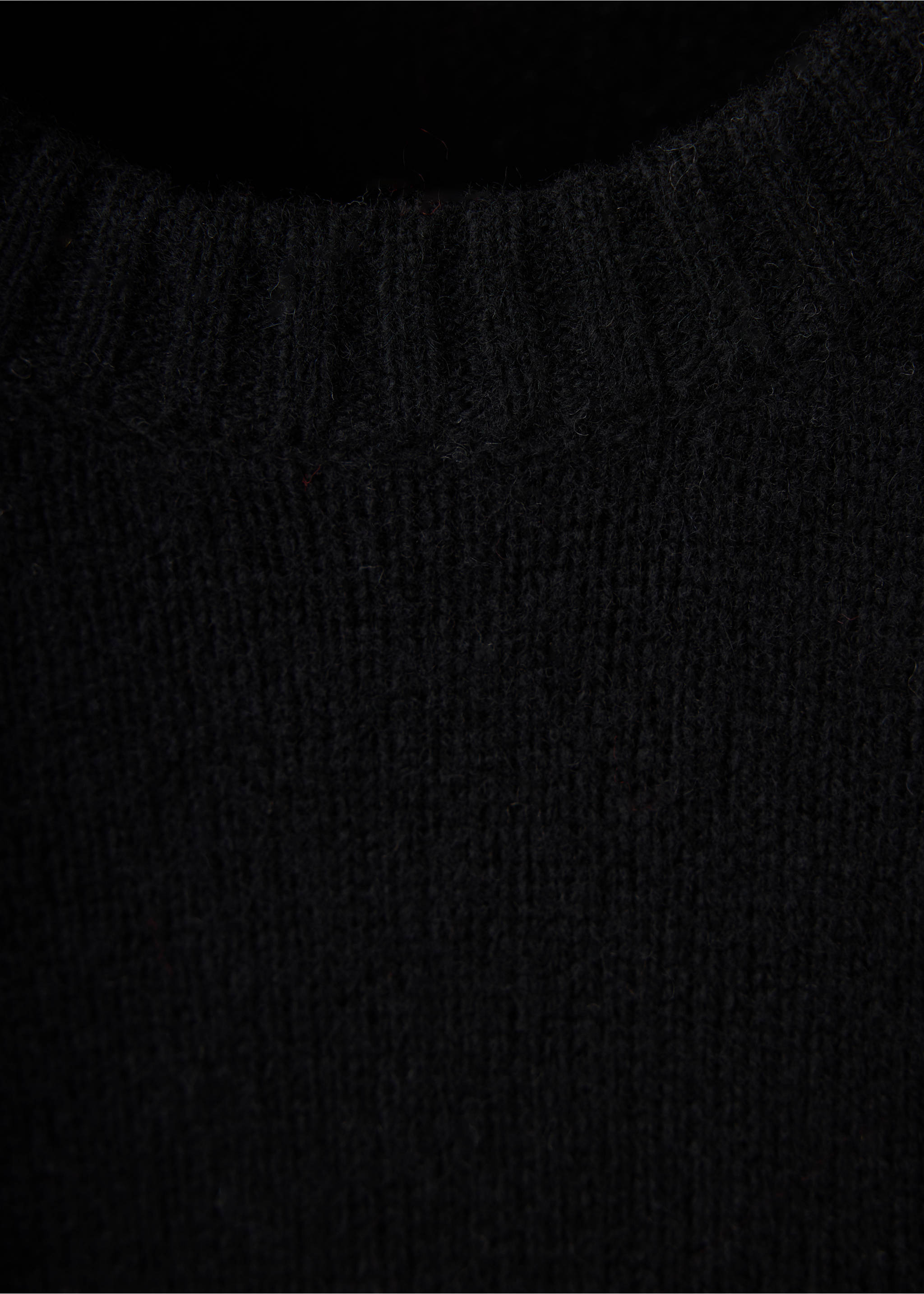 Close-up of a black knitted crew neck jersey., Black. Ref: 37039227-00.