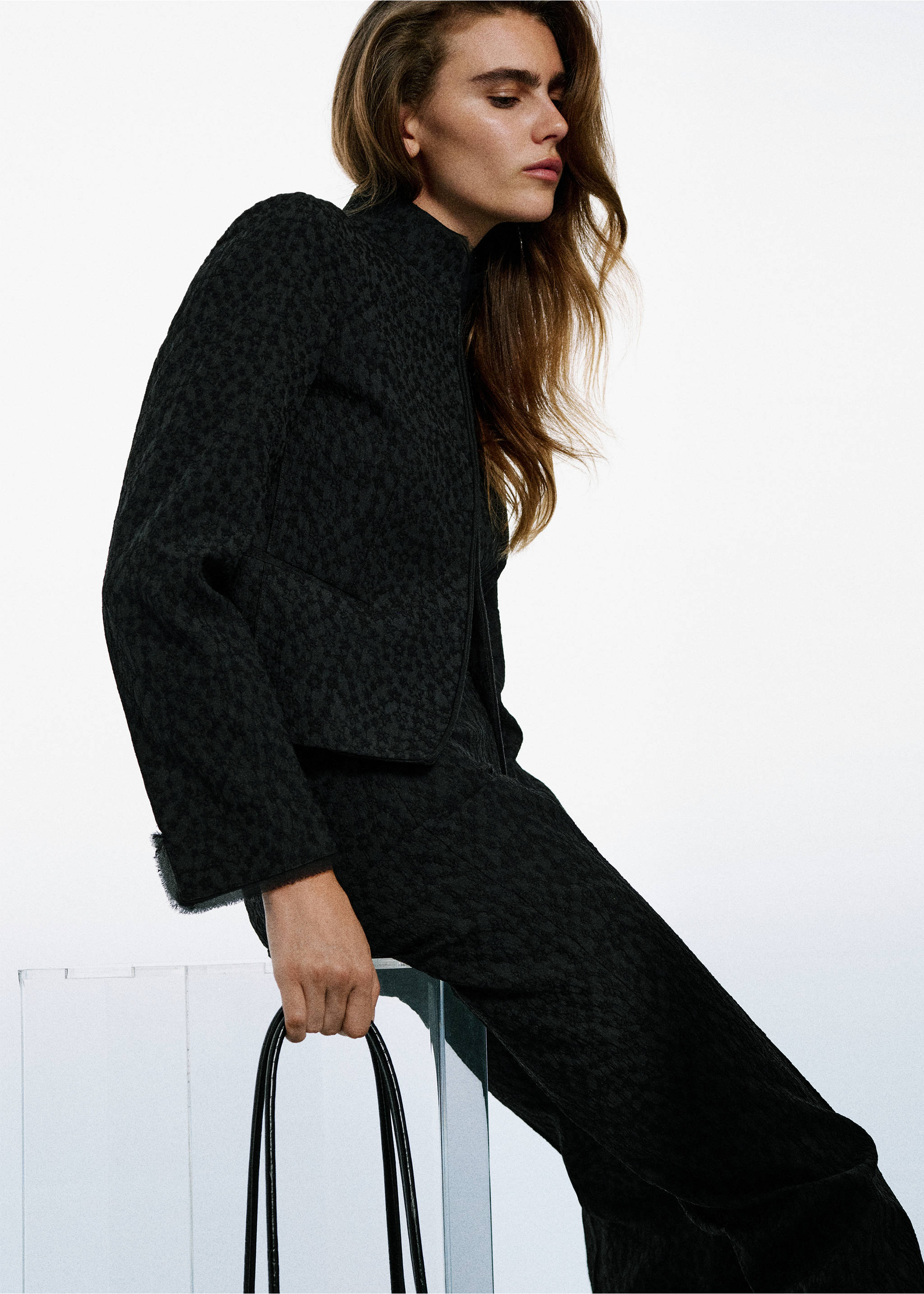 Black textured trousers worn with a matching cropped jacket., Black. Ref: 37039404-00.