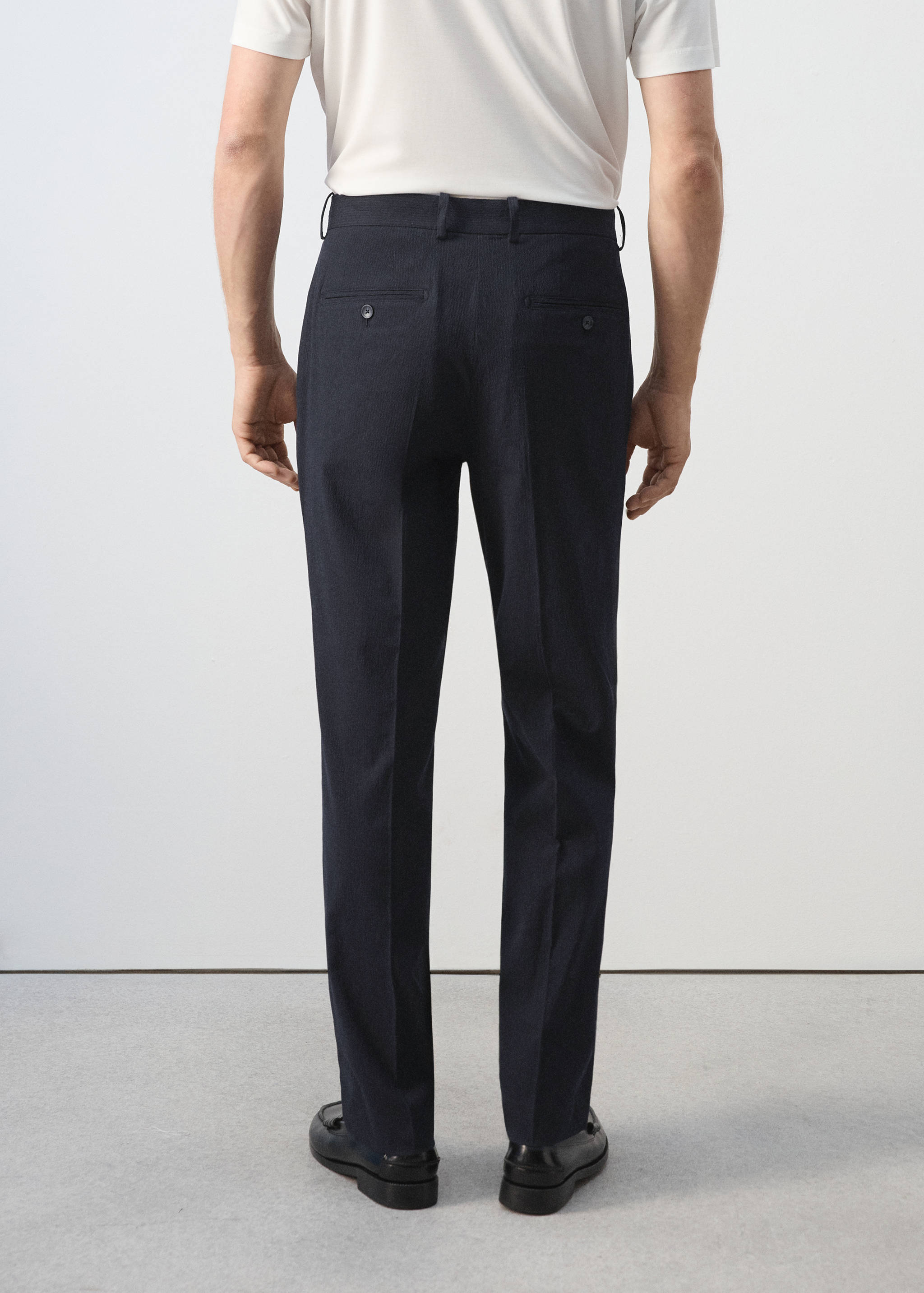 Calças slim fit de mistura de algodão e liocel - Verso do artigo