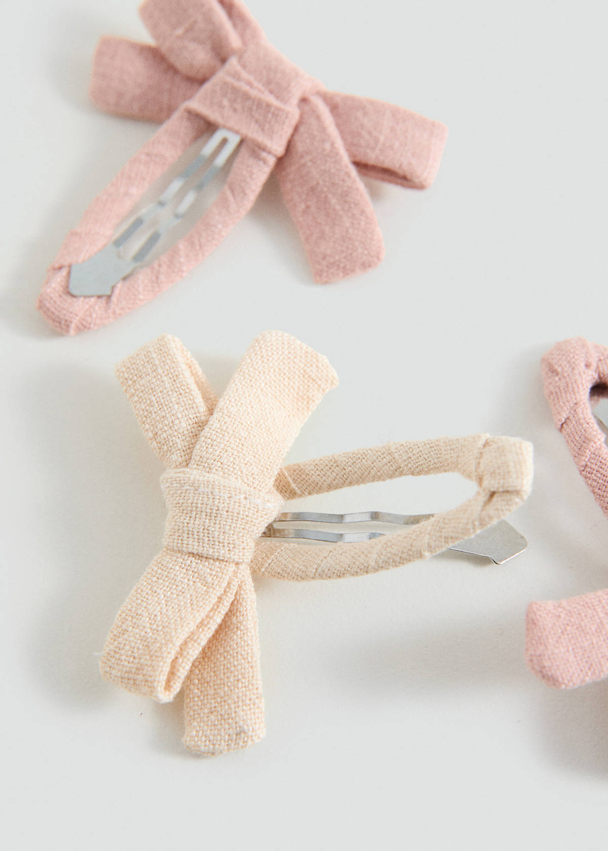 Pack of 4 bow clips — Pale Pink