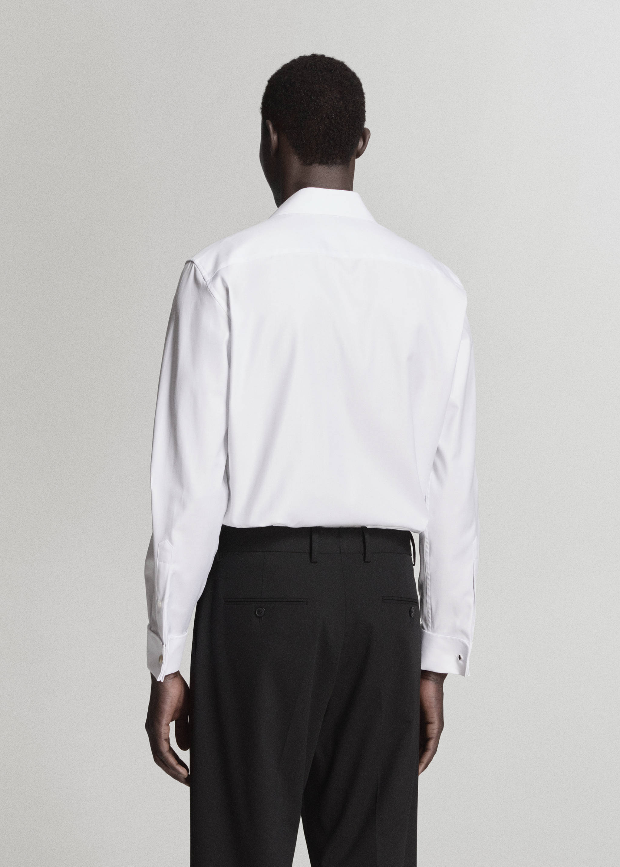 Plain 100% cotton shirt - Reverse of the article