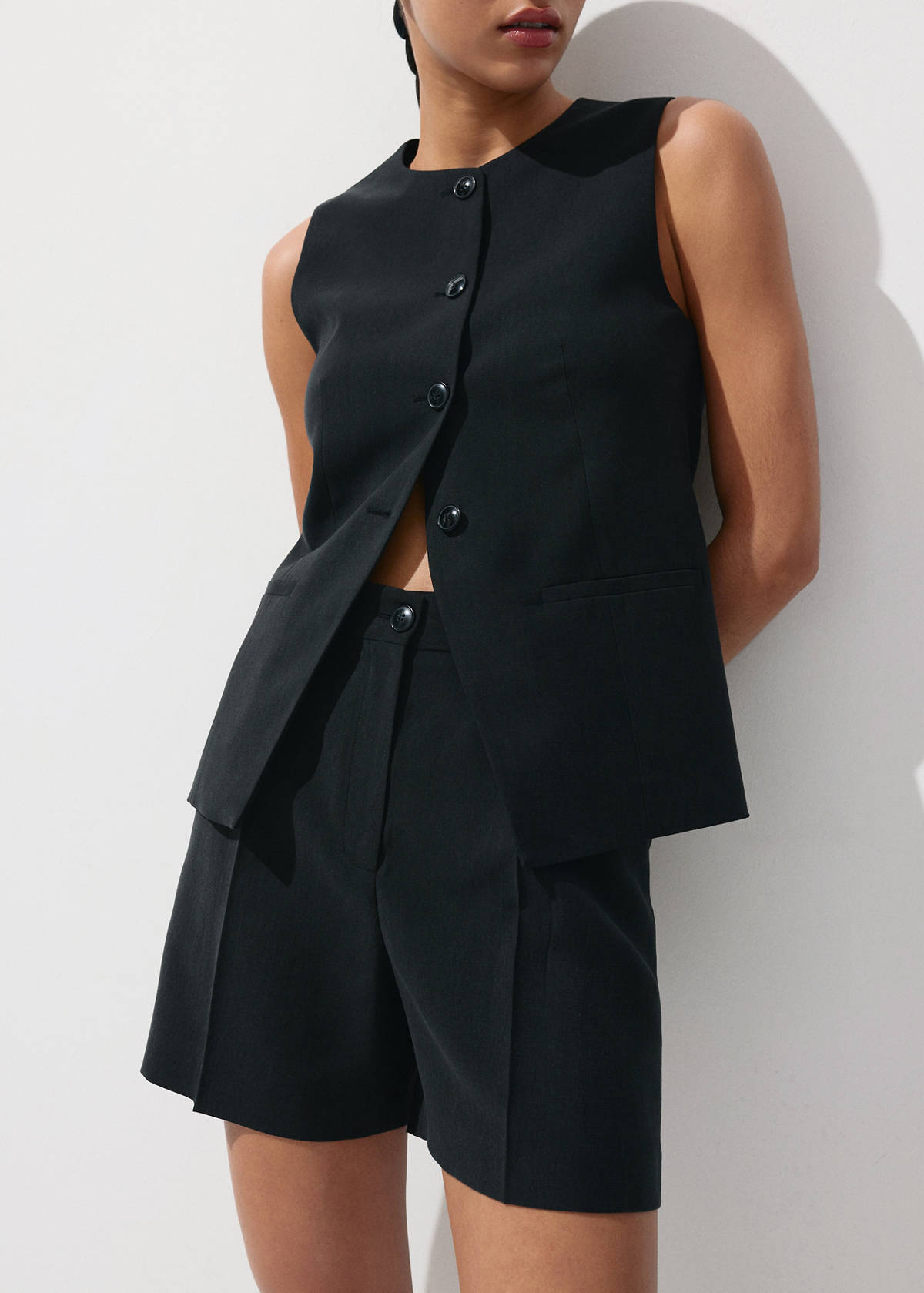 Waistcoat with buttons and pockets — Black