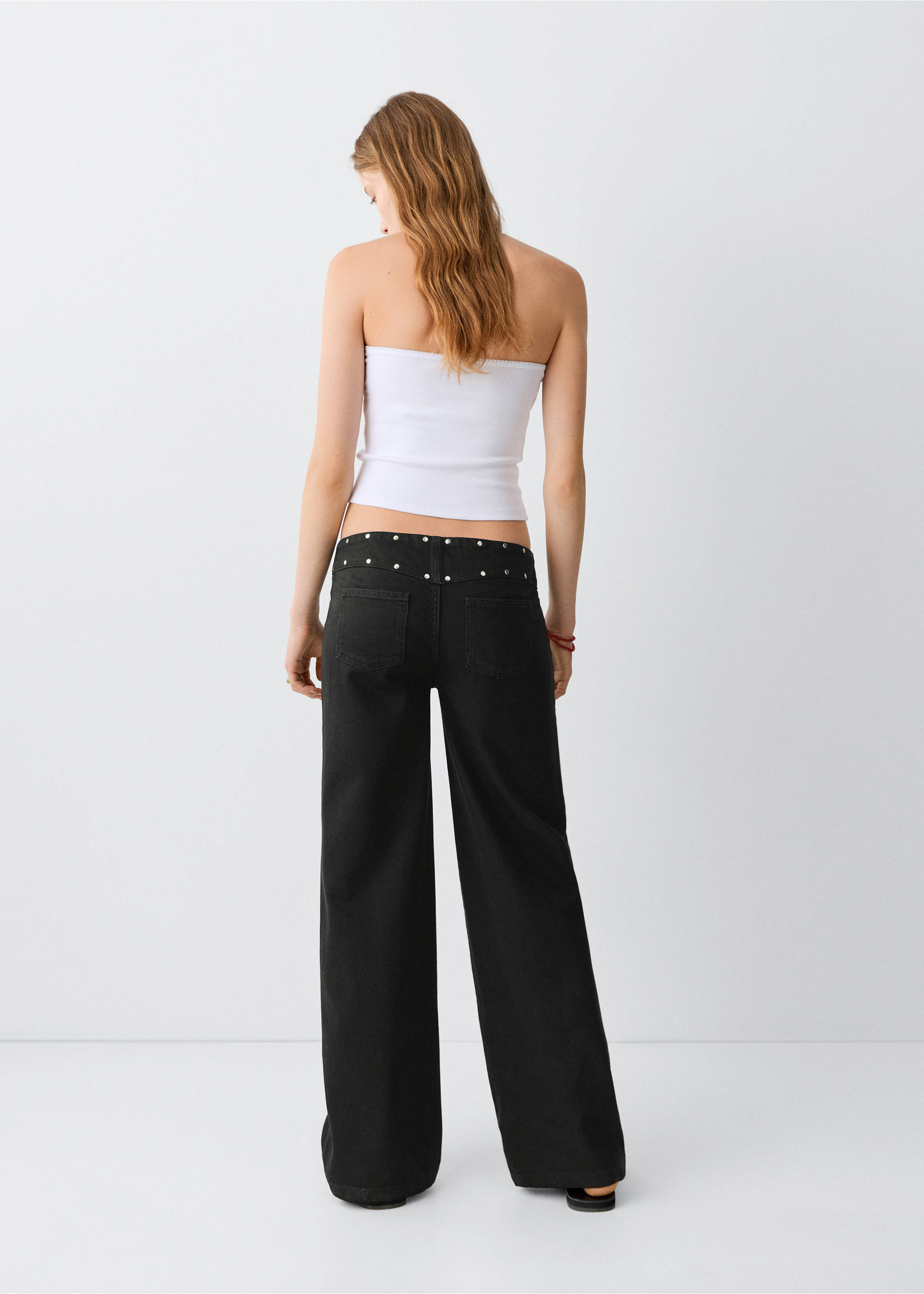 Jean taille basse à clous - Verso de l’article, Black denim. Ref: 37041436-00.