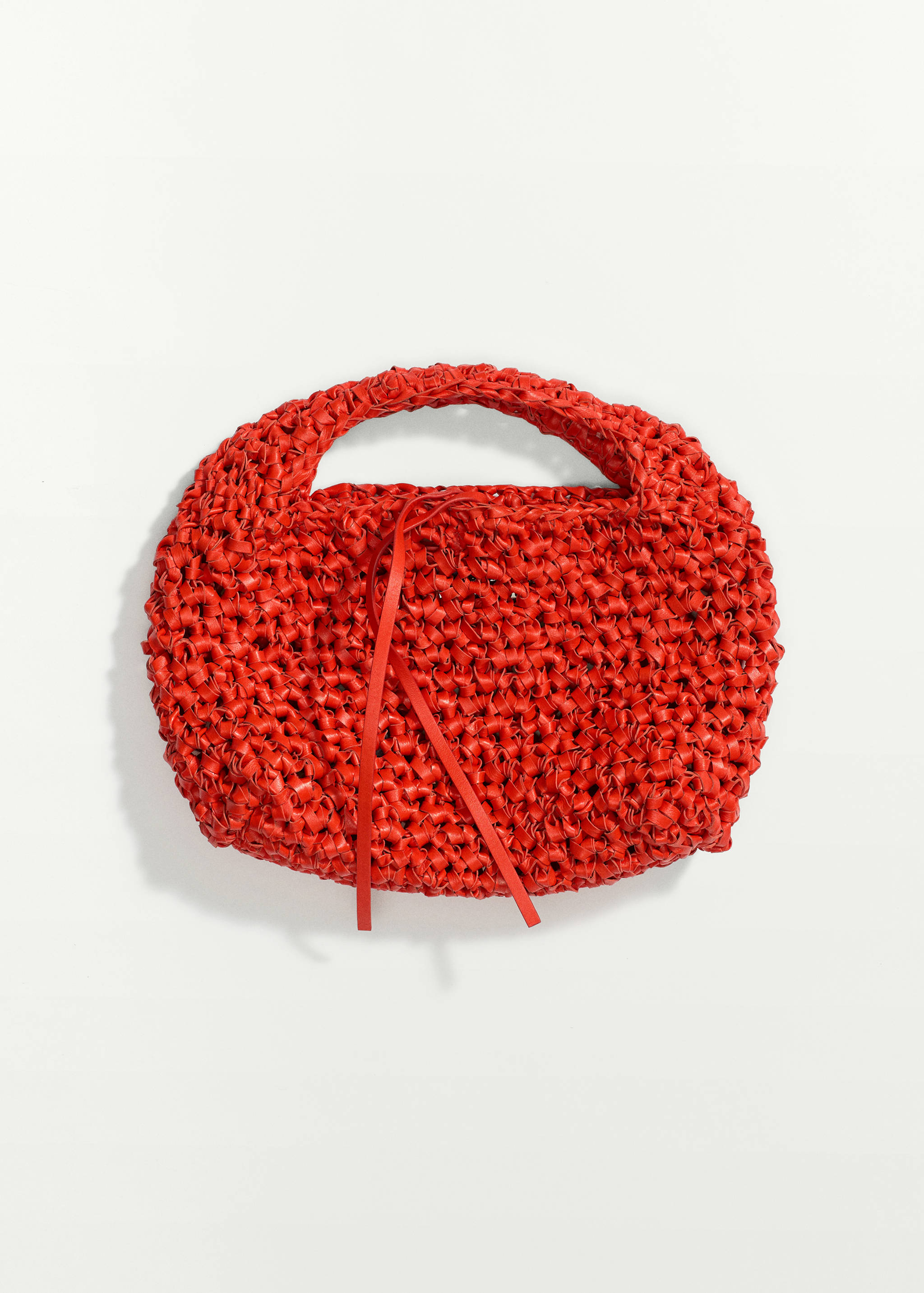 Bossa de mà handmade pell trenada - Pla mig