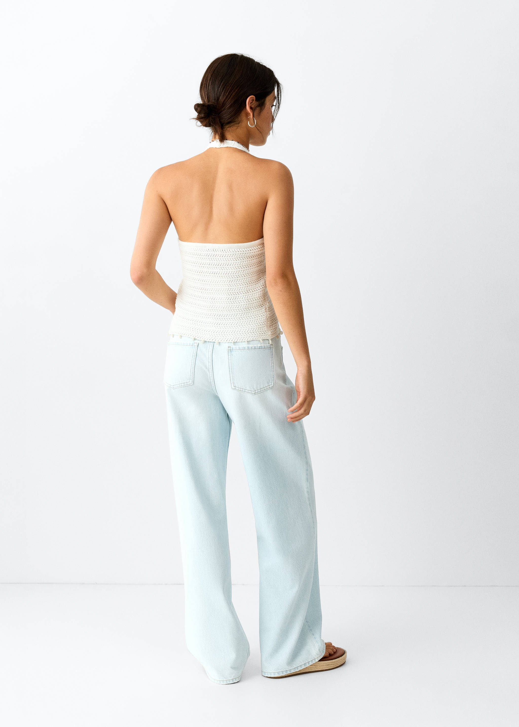 Crossed straight jeans - Reverse of the article