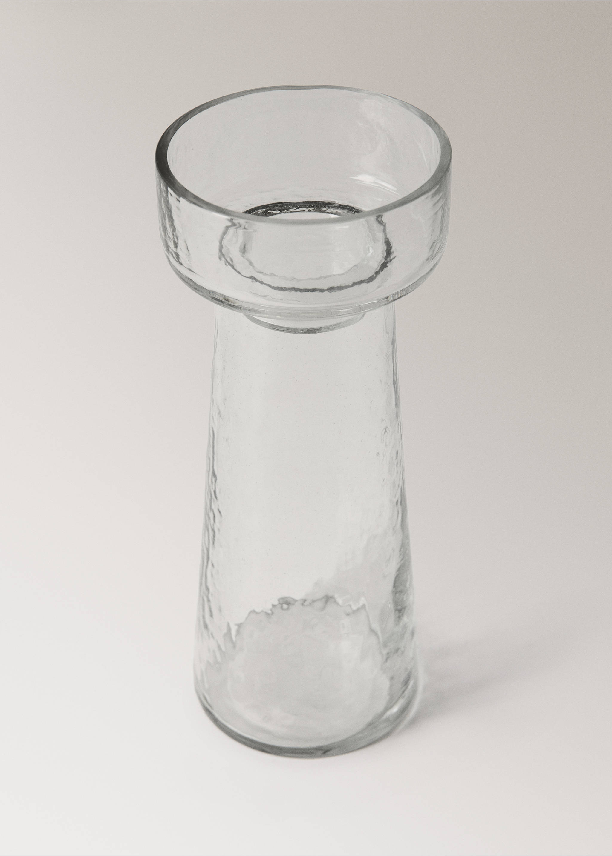 Clear glass candle holder with a flared top and textured body., Black. Ref: 37043294-00.