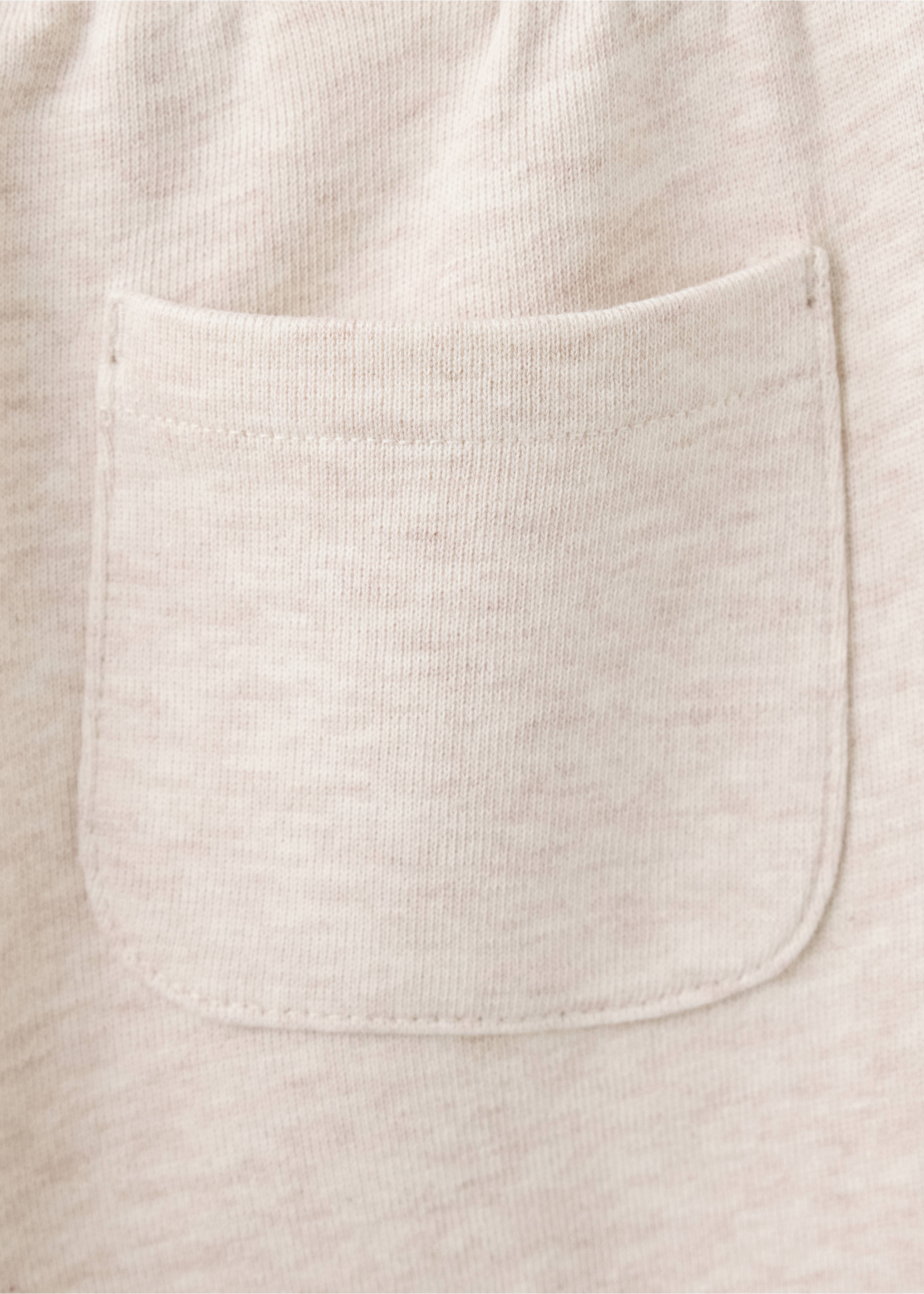 Jogger trousers with stitch detail - Details of the article 0, Sand. Ref: 37043313-00.