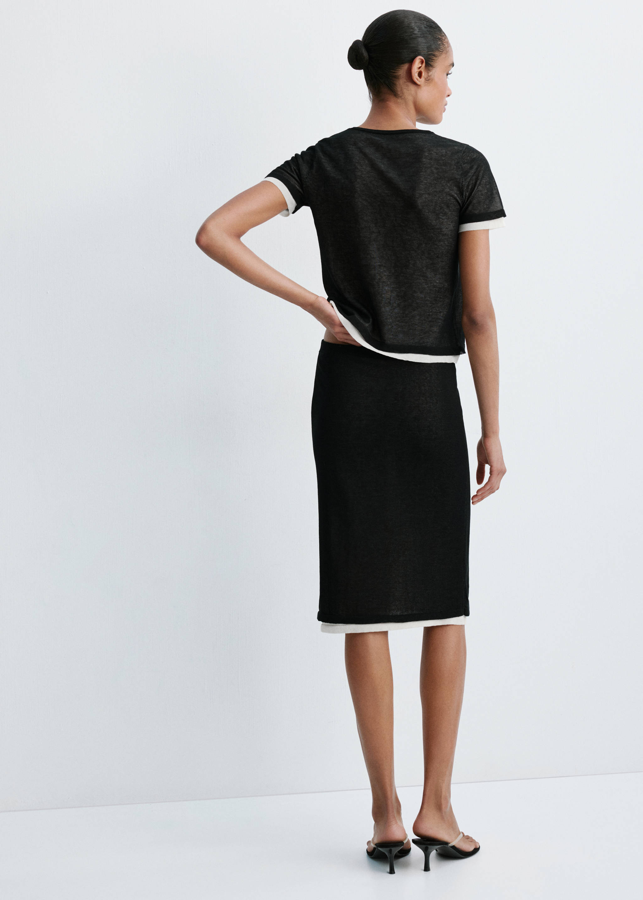 Short-sleeved combined sweater - Reverse of the article