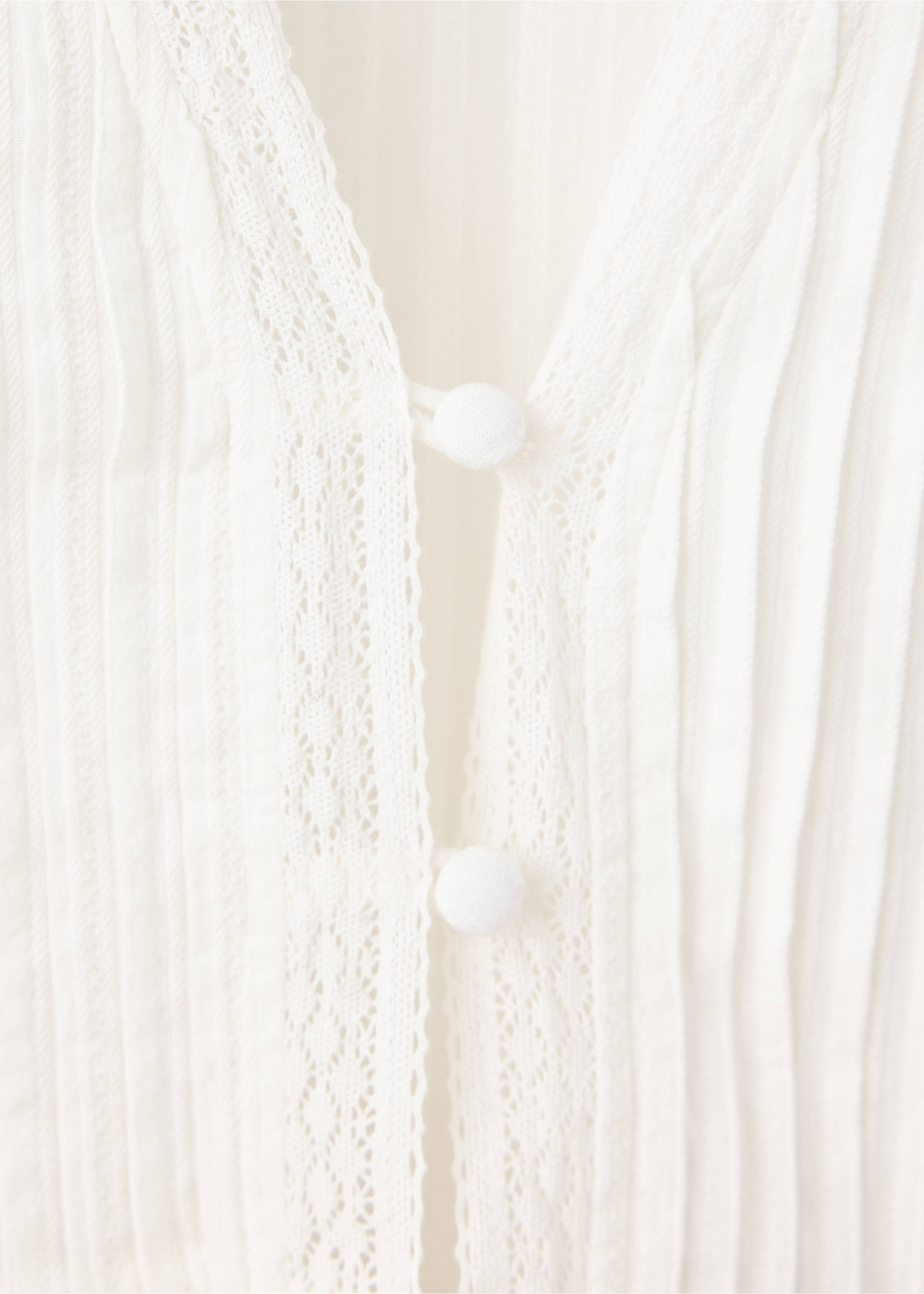 Blouse texturée détails ajourés - Détail de l'article 8, Blanc cassé. Ref: 37044094-00.
