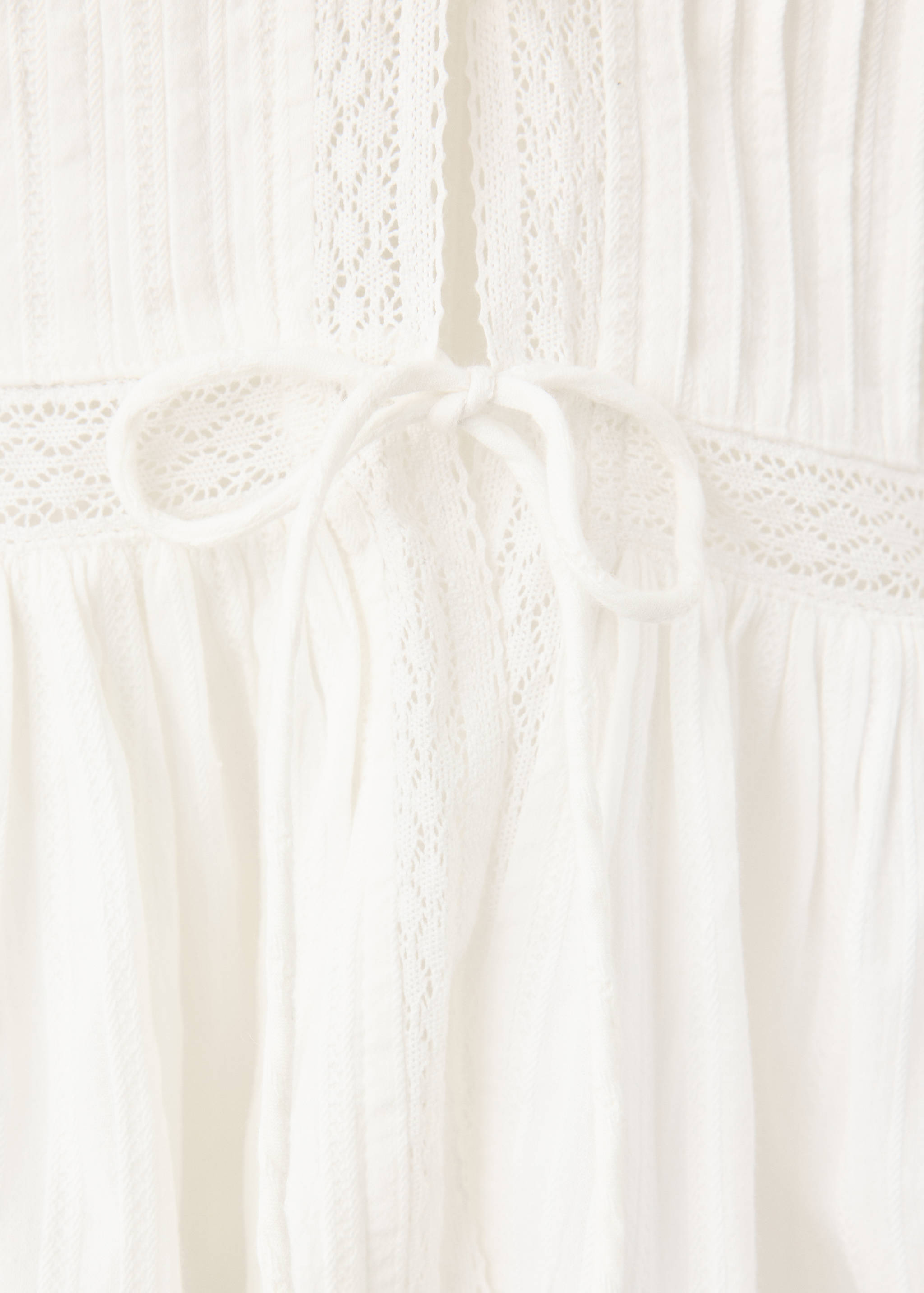 Blouse texturée détails ajourés - Détail de l'article 0