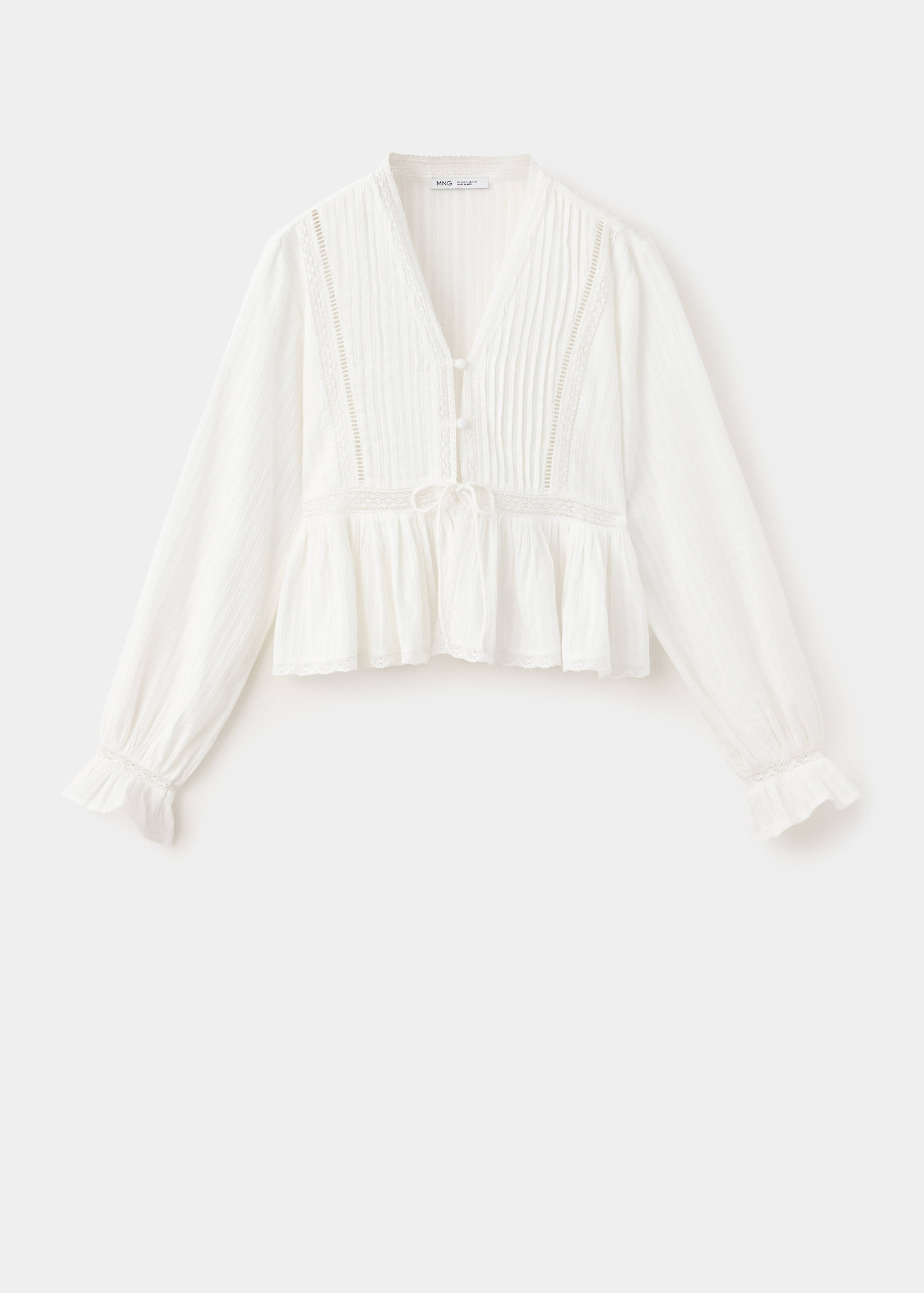 Blouse texturée détails ajourés - Article sans modèle