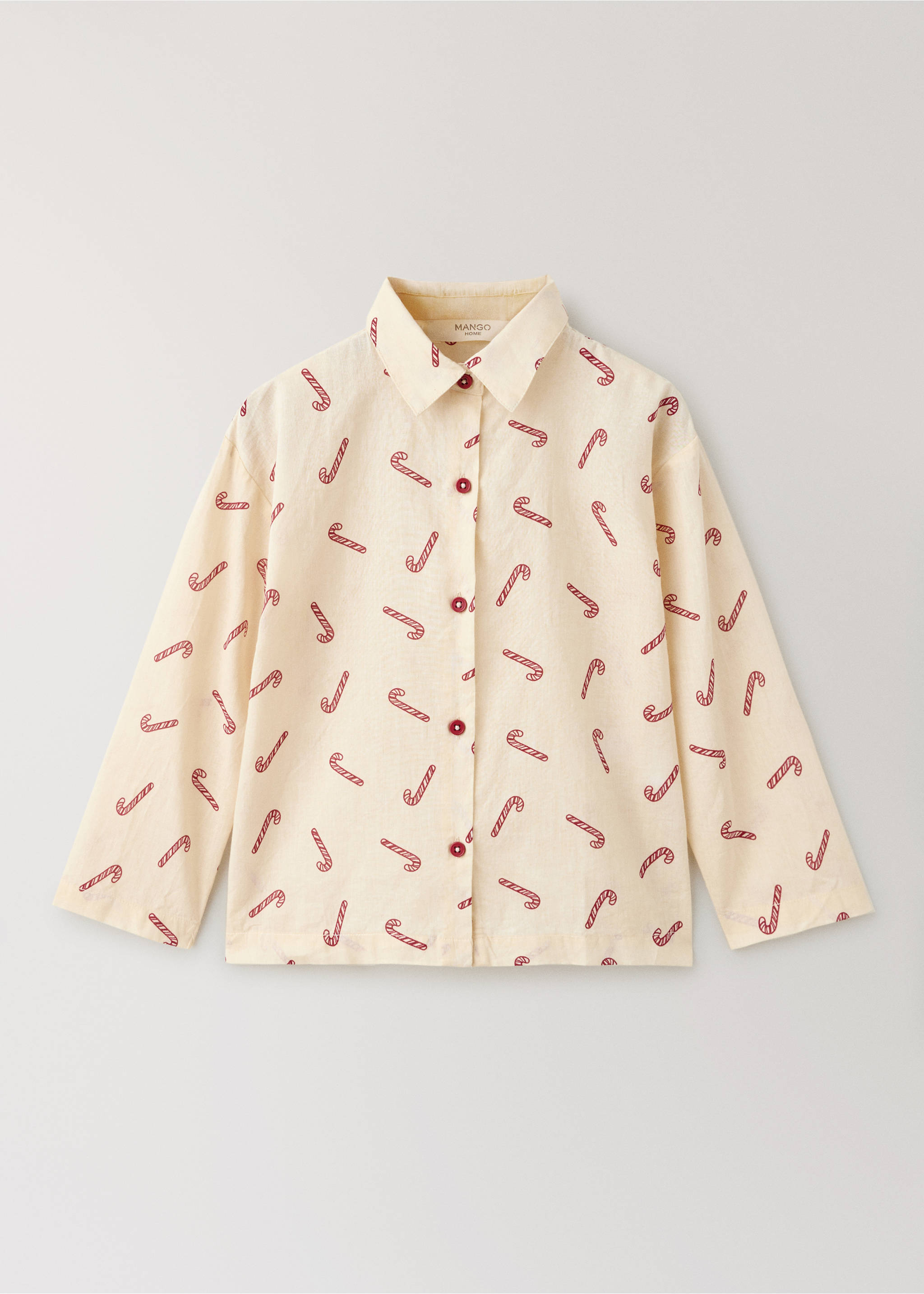 Cream pyjama shirt with a red candy cane print and button fastening., Off White. Ref: 37044452-00.