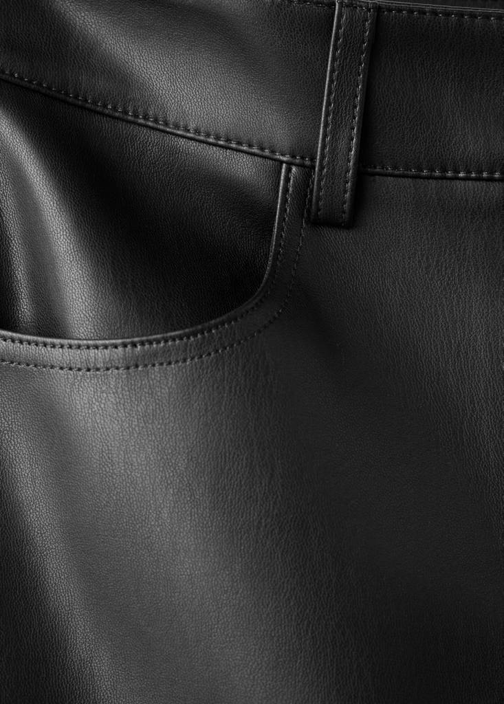 Faux-leather flared trousers — Black