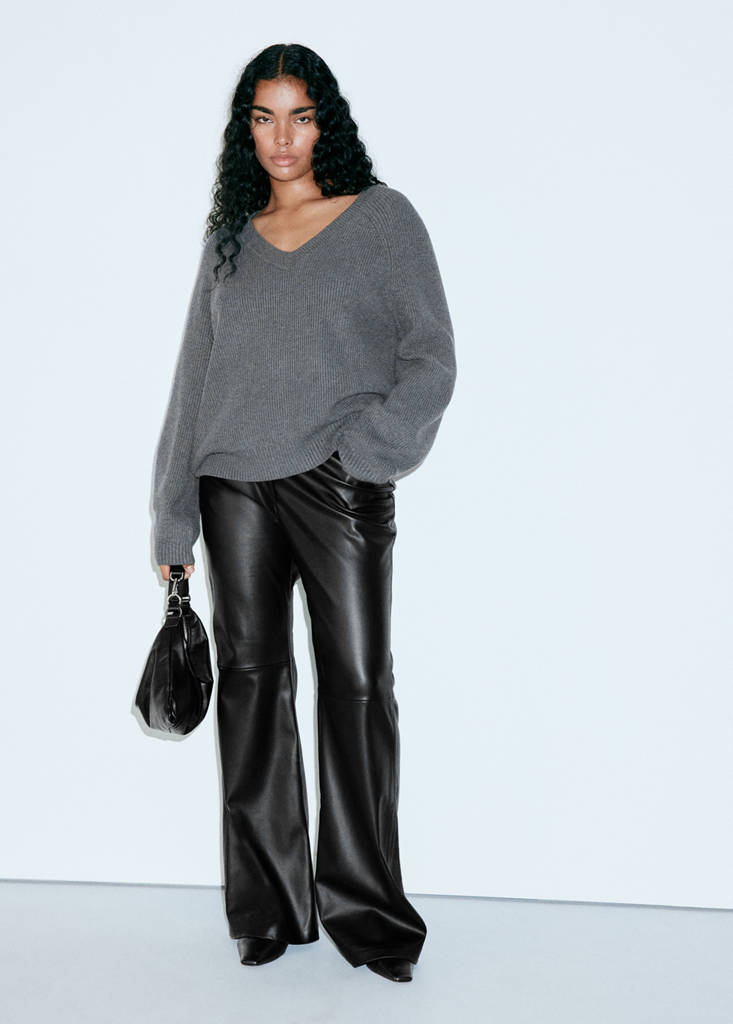 Faux-leather flared trousers — Black