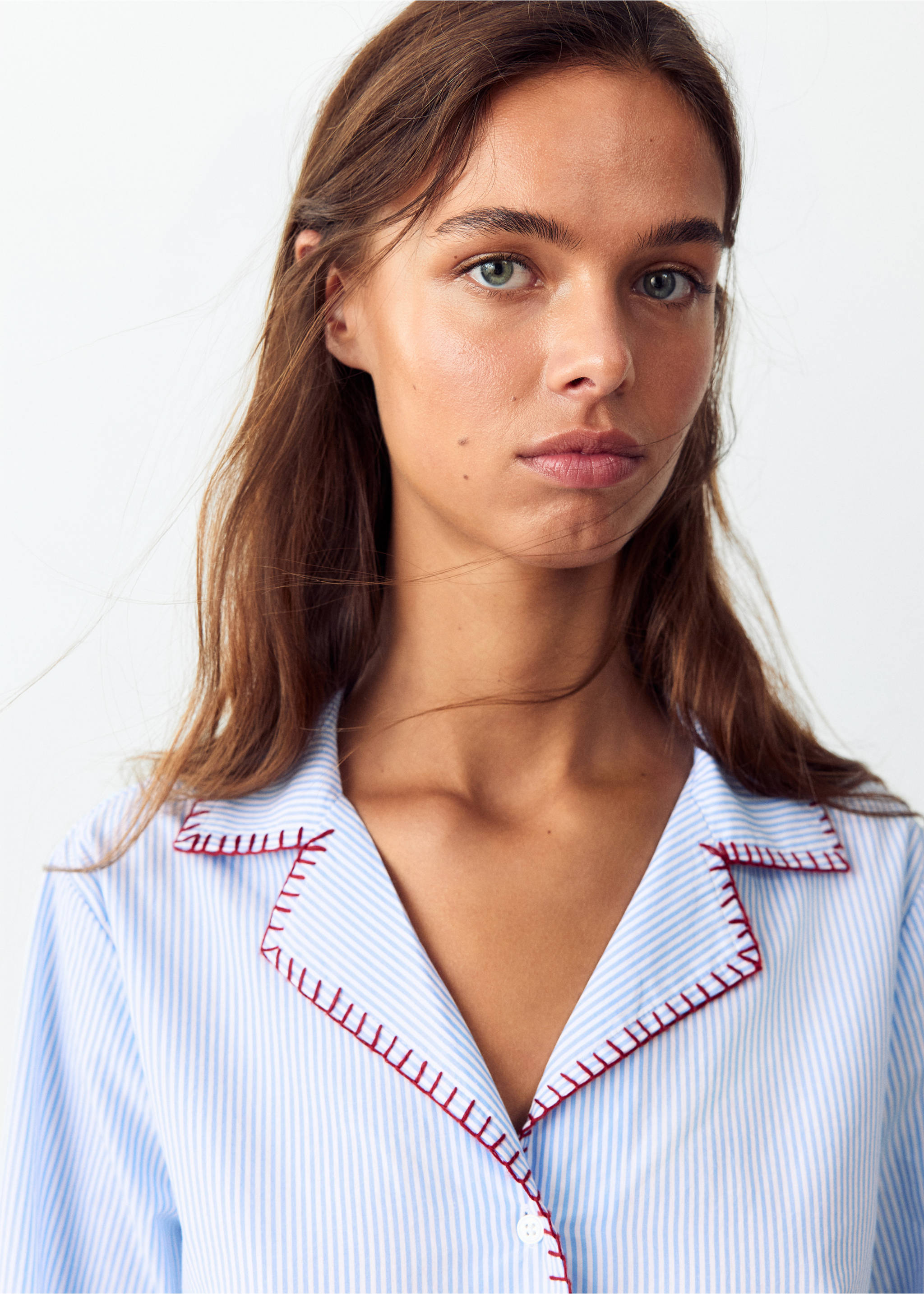 Full striped pyjamas with topstitch detail - Details of the article 1, Blue. Ref: 37045164-00.