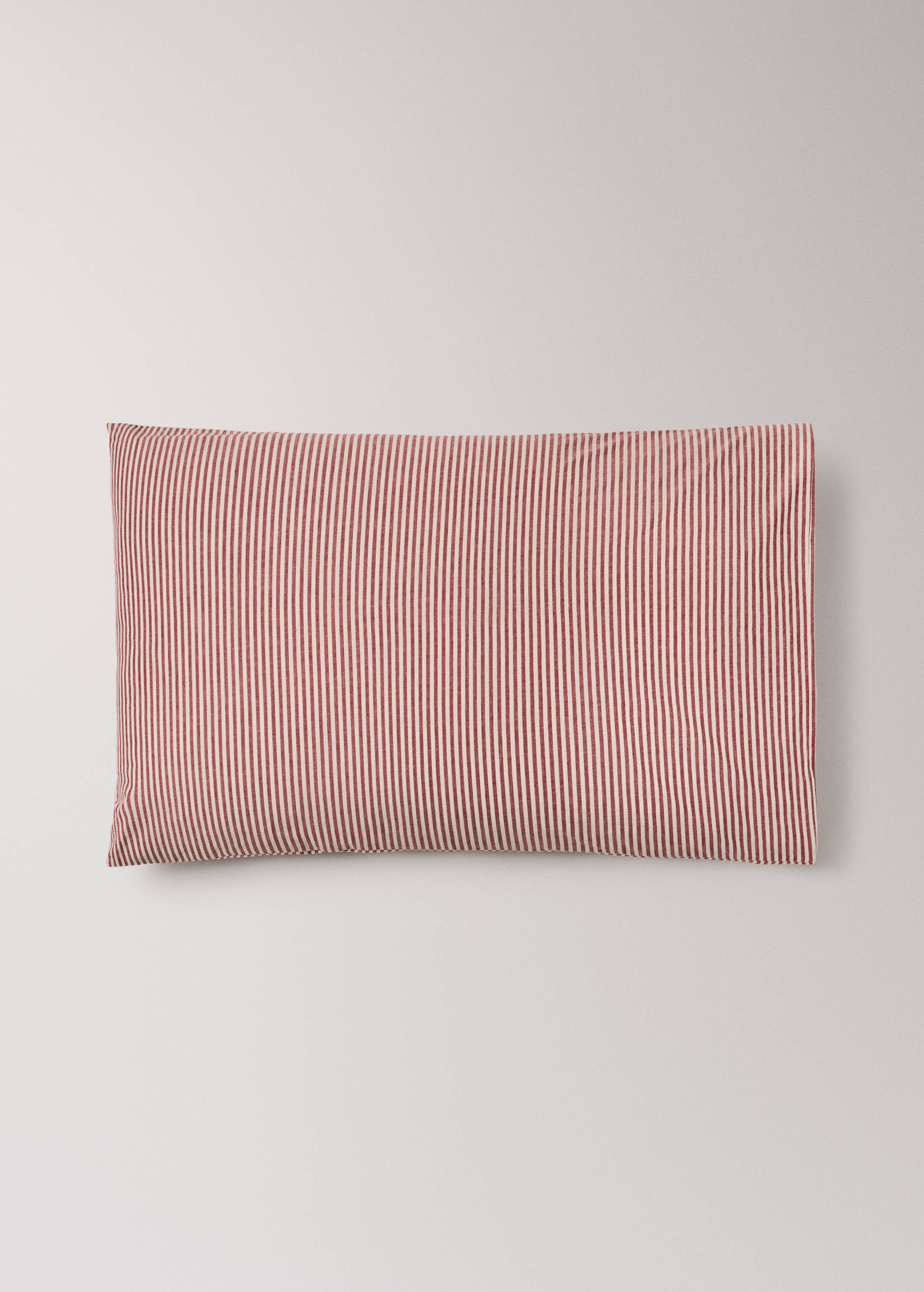 Red and white striped pillowcase.