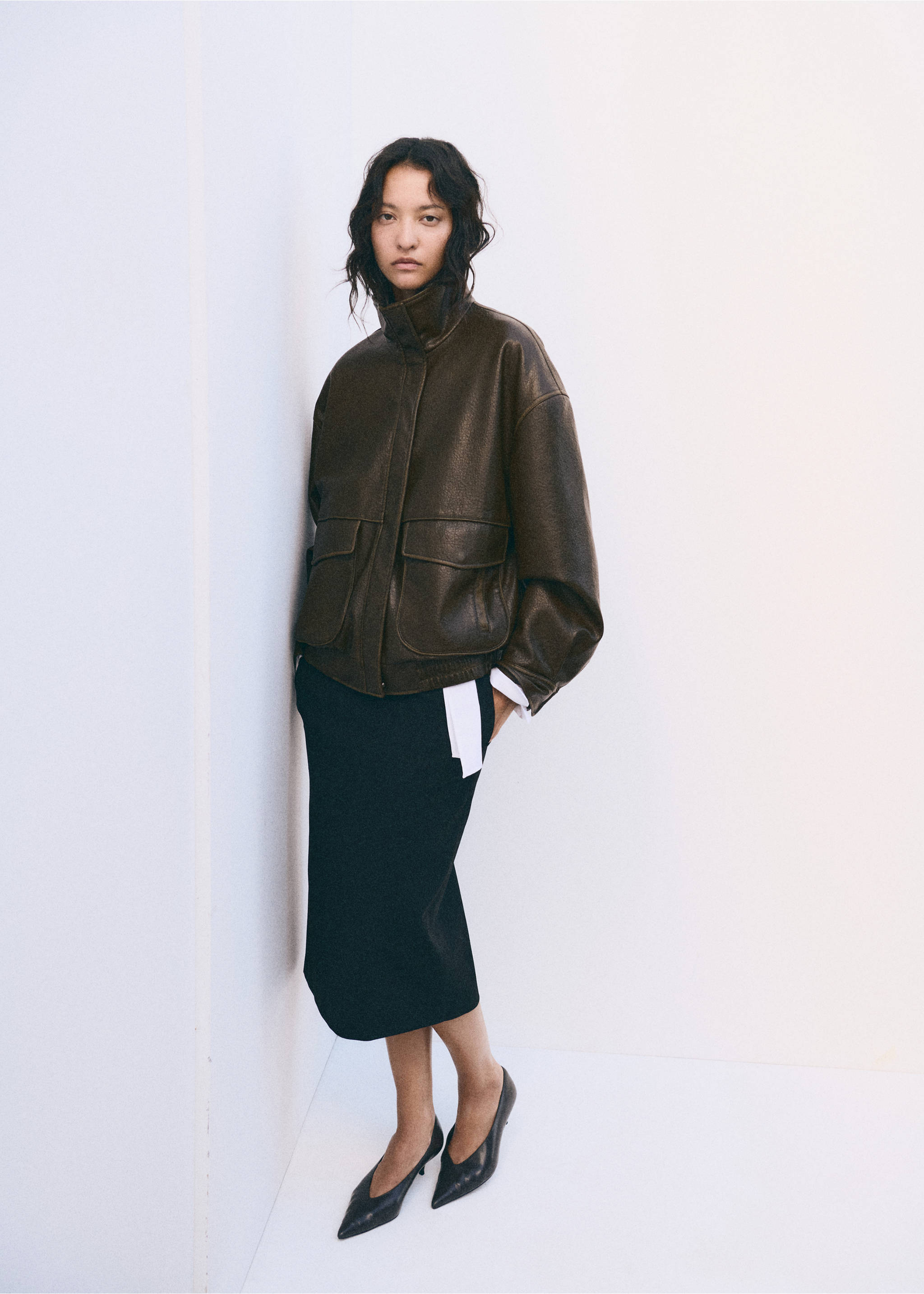 Dark brown oversized jacket with high collar and large front pockets worn by a model., Khaki. Ref: 37046742-01.