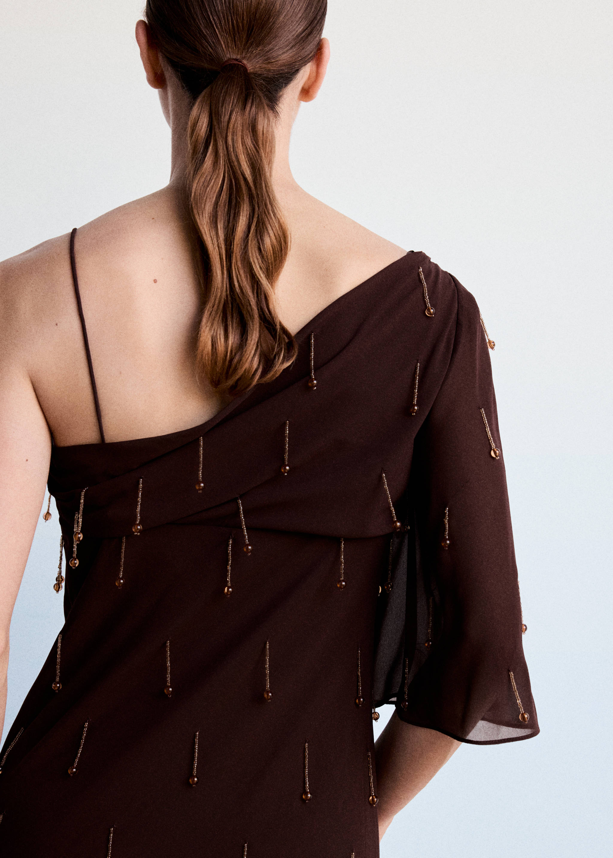 Asymmetric dress with fringes and embellishments - Details of the article 1