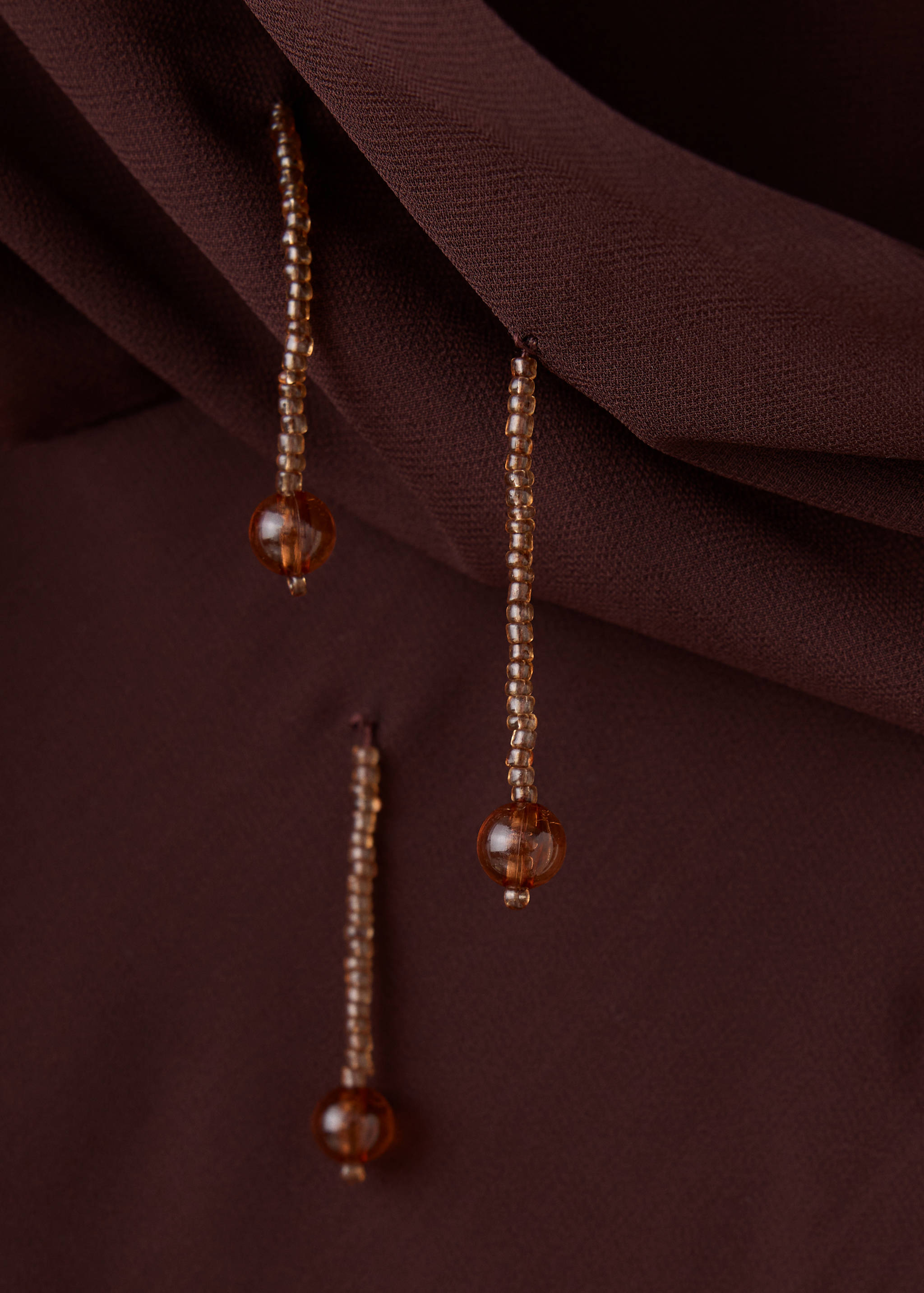 Robe asymétrique en mousseline à franges ornées de perles - Détail de l'article 8