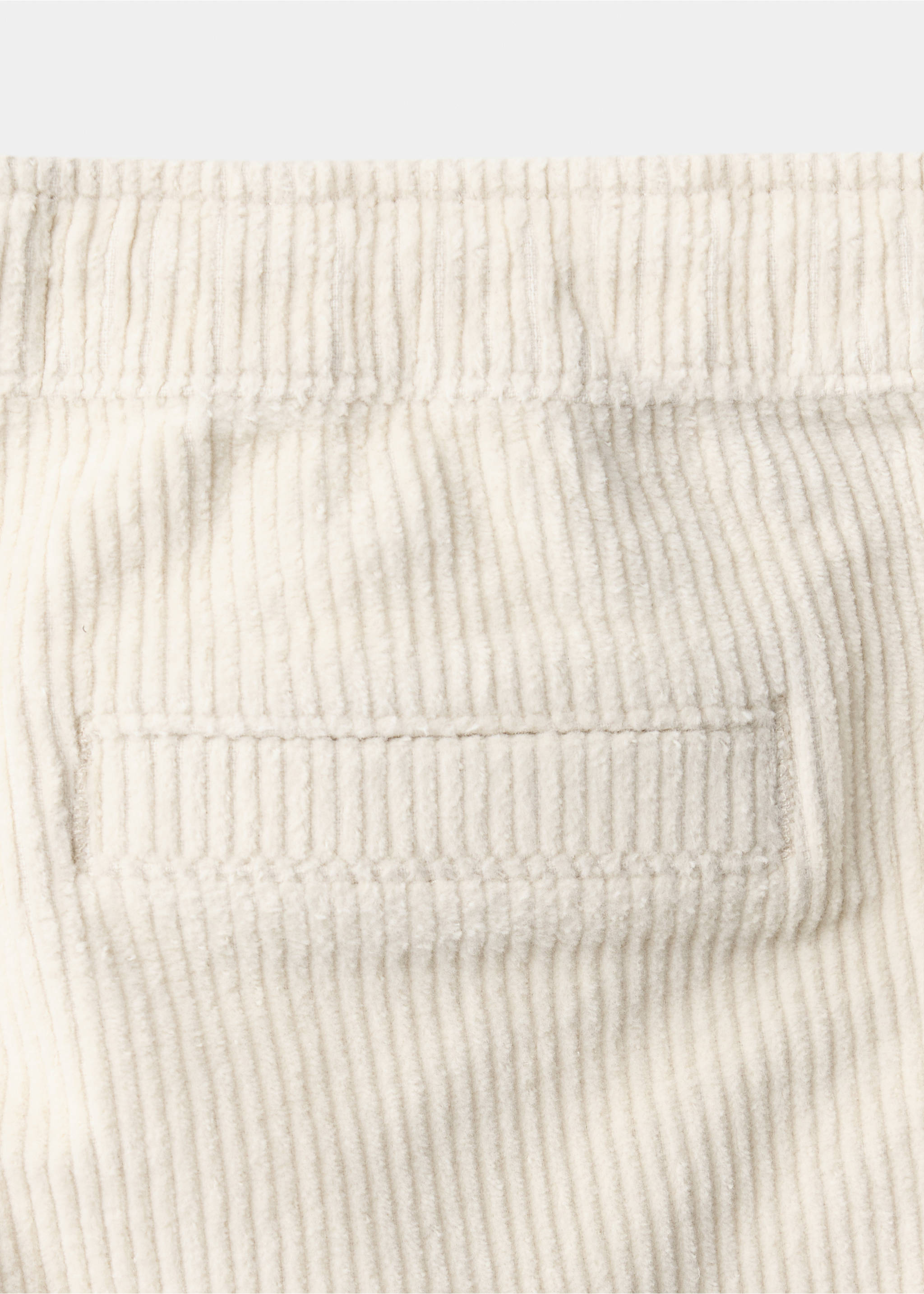 Off-white corduroy texture detail on trousers., Ecru. Ref: 37047125-00.