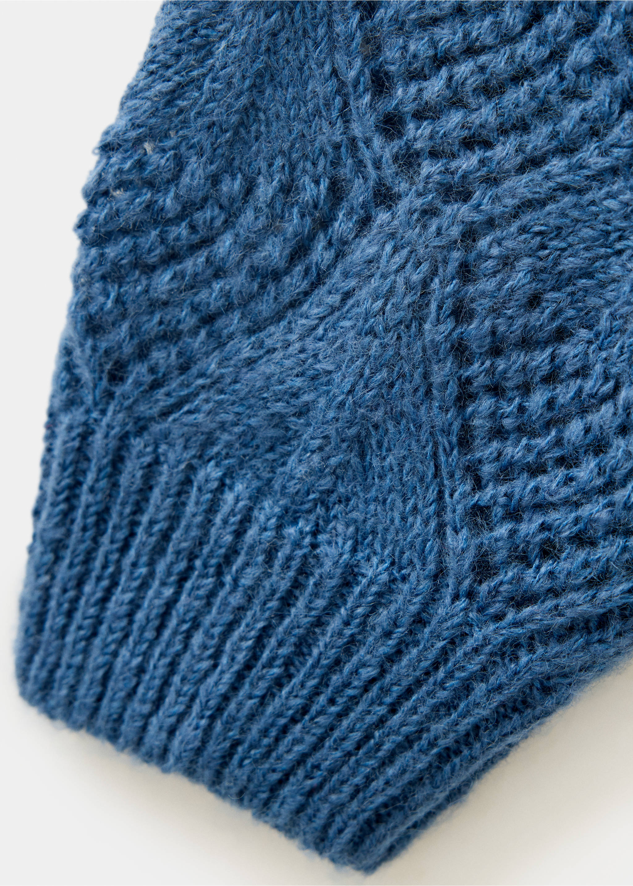 Close-up of blue knitted jersey texture and ribbed hem., Blue. Ref: 37047136-00.