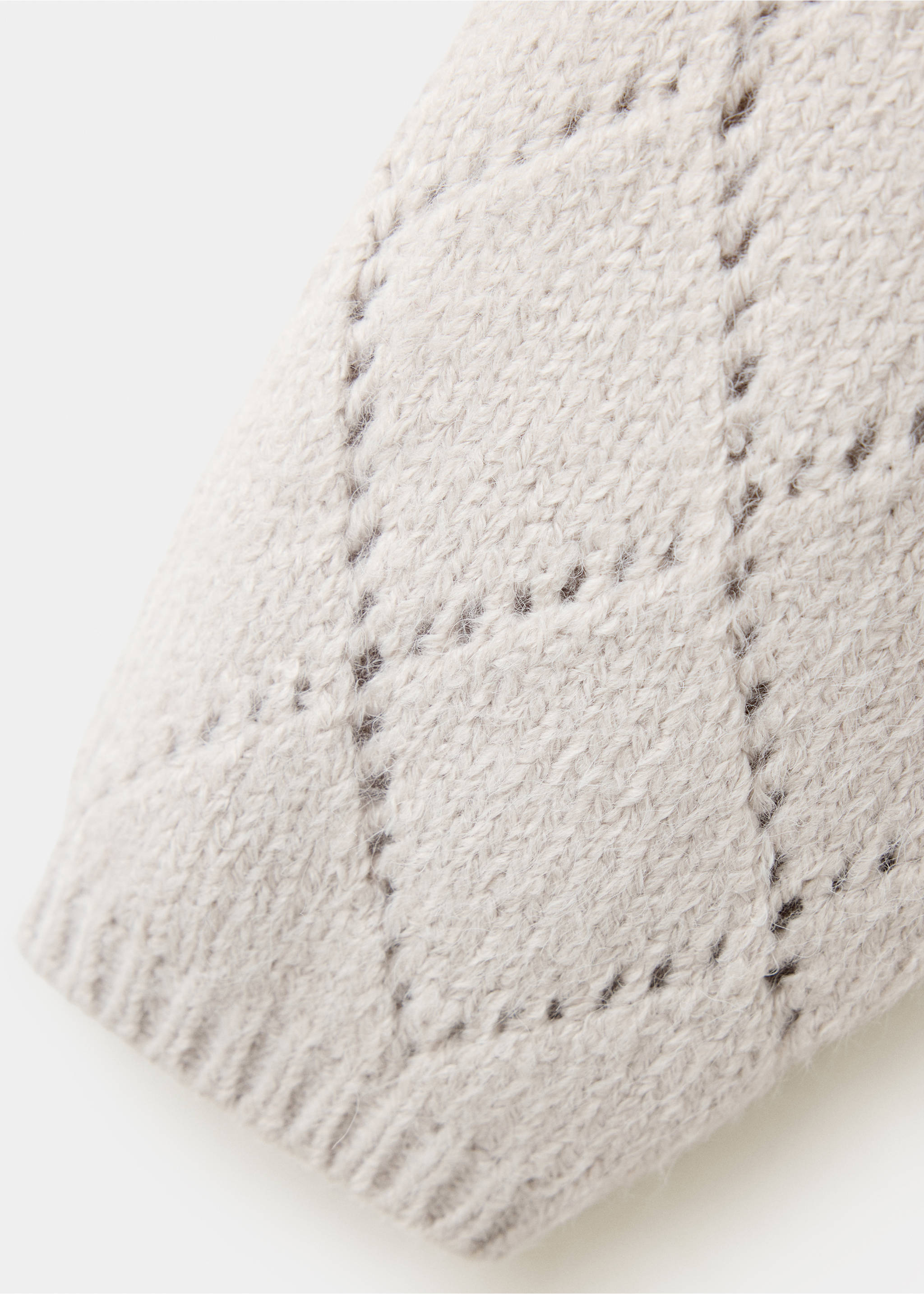 Close-up of a beige jersey fabric detail with a textured knit pattern., Sand. Ref: 37047137-00.