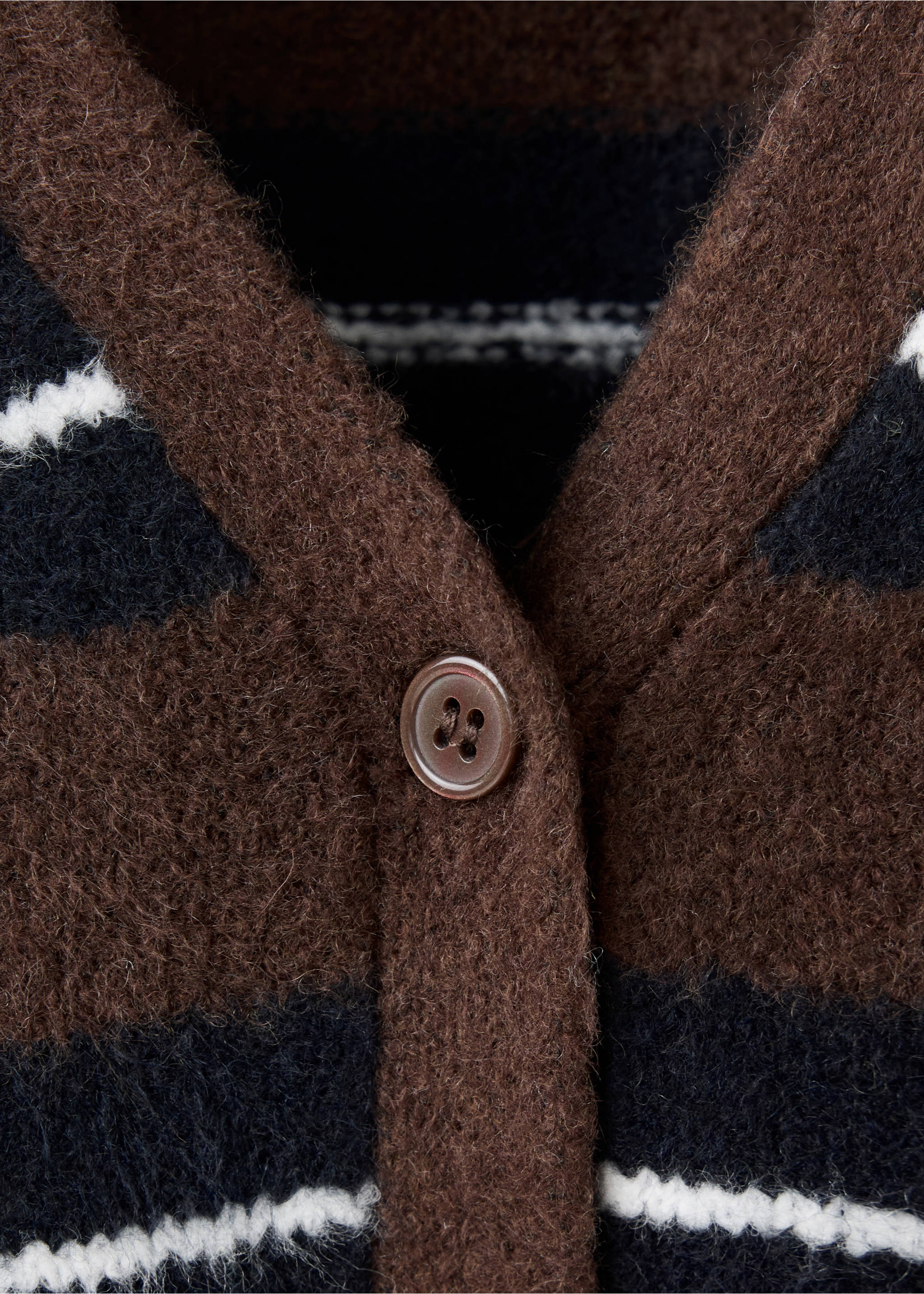 Close-up of a striped knit cardigan featuring a V-neck and button closure., Brown. Ref: 37047774-00.