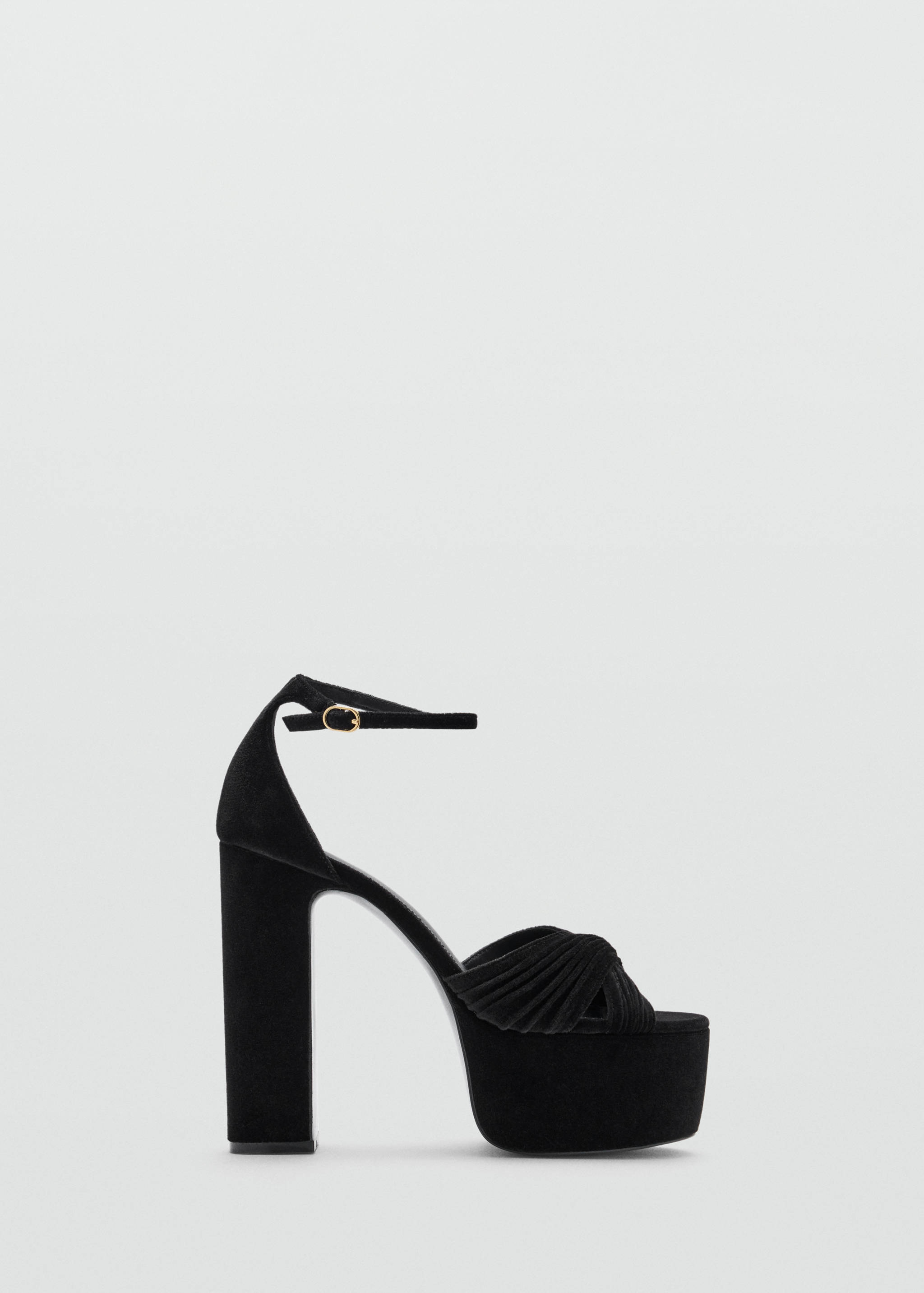 Black platform sandals with a chunky block heel and pleated strap.