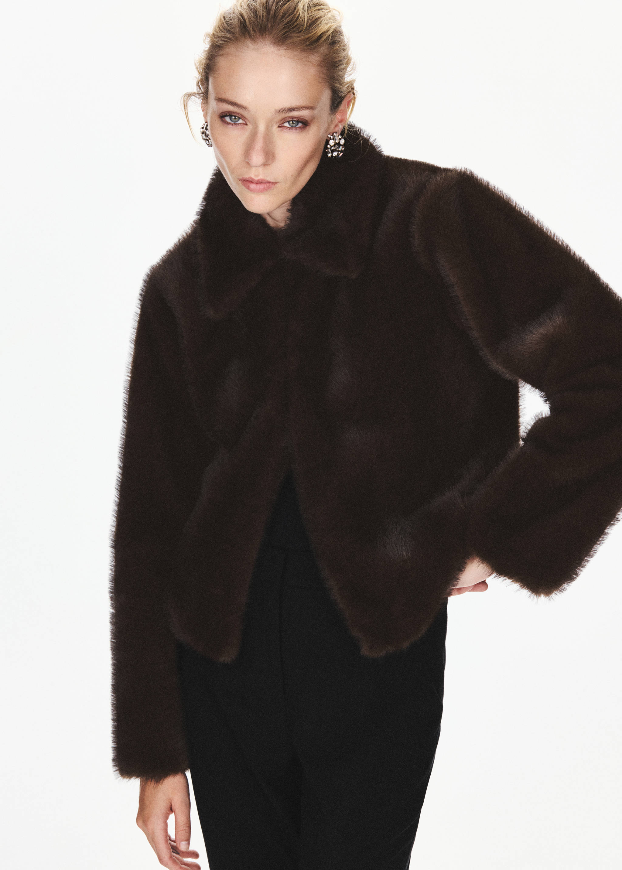 Dark brown faux-fur jacket with wide collar.