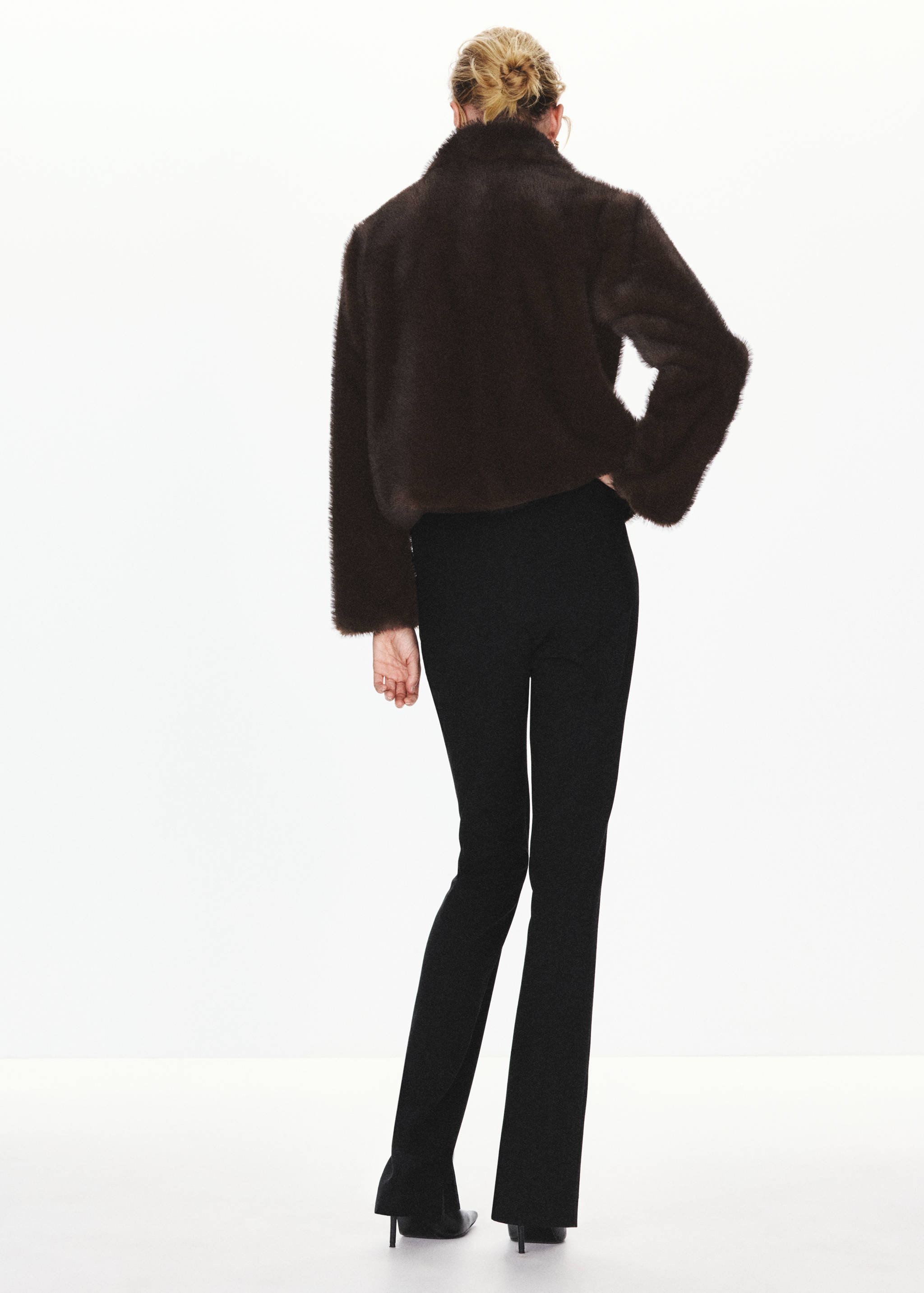 Dark brown textured faux-fur jacket, back view.