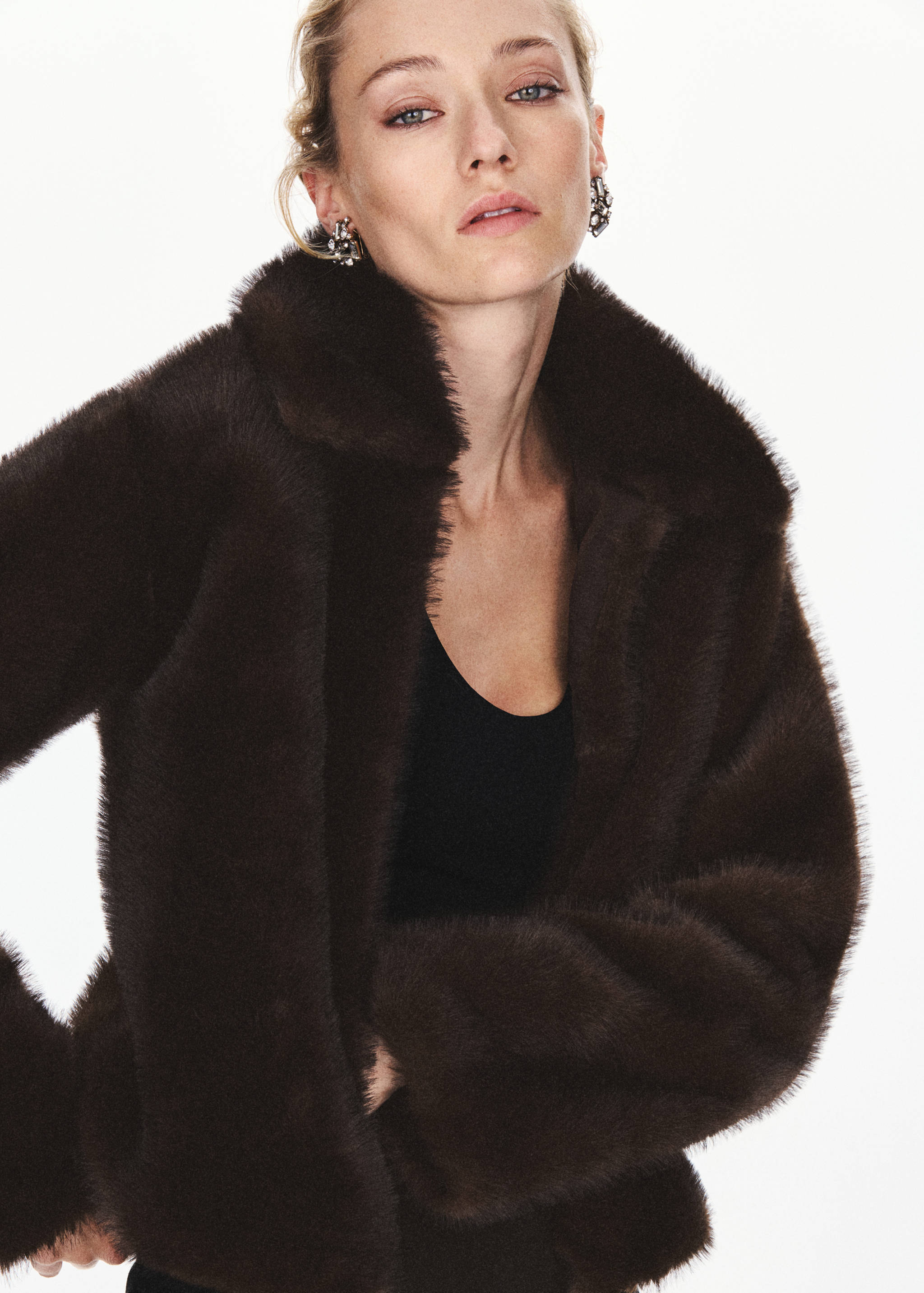 Dark brown faux-fur jacket with a wide collar.
