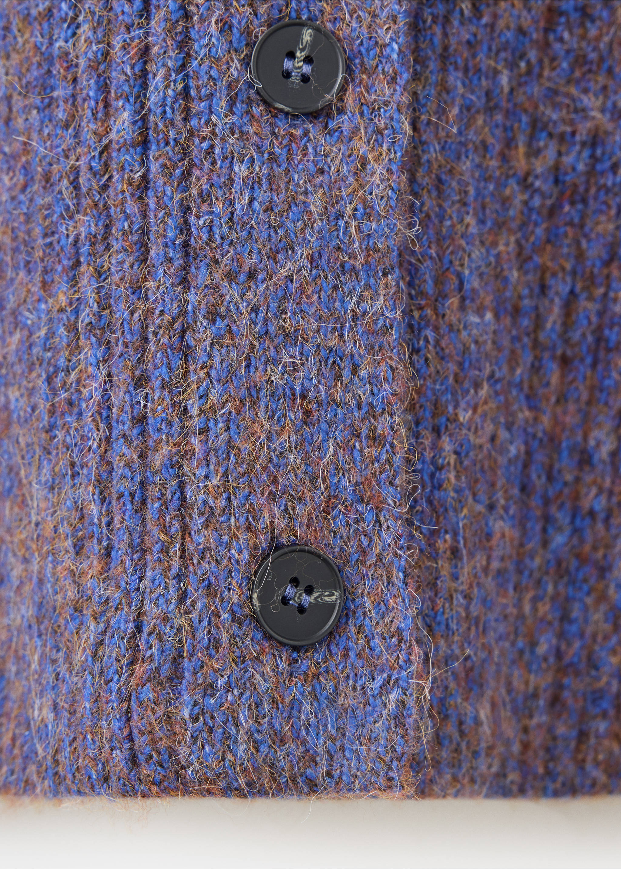 Blue textured knit cardigan fabric close-up with buttons., Purple. Ref: 37047787-00.