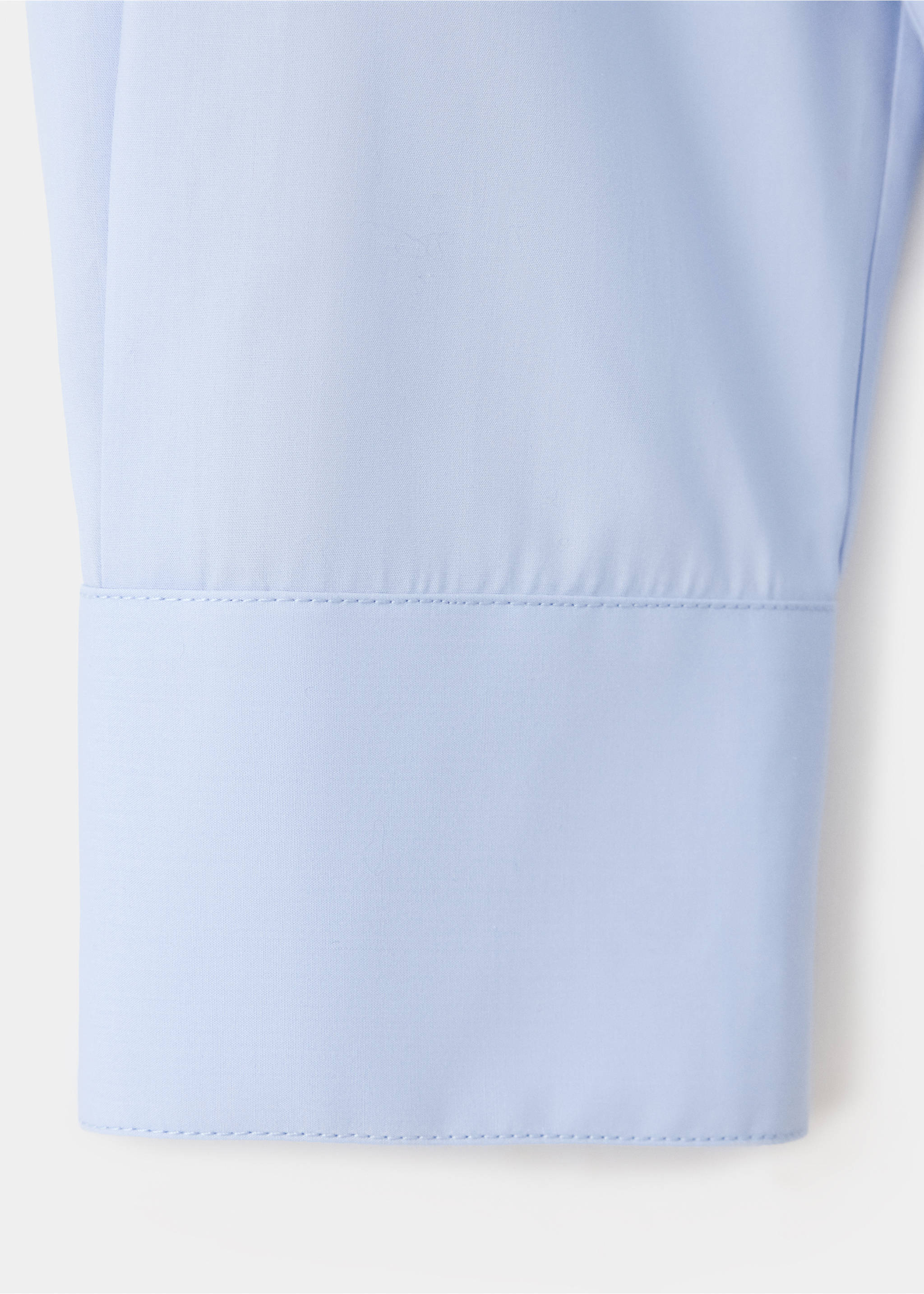 Close-up of the light blue fabric and cuff on a women's shirt., Sky Blue. Ref: 37047793-00.