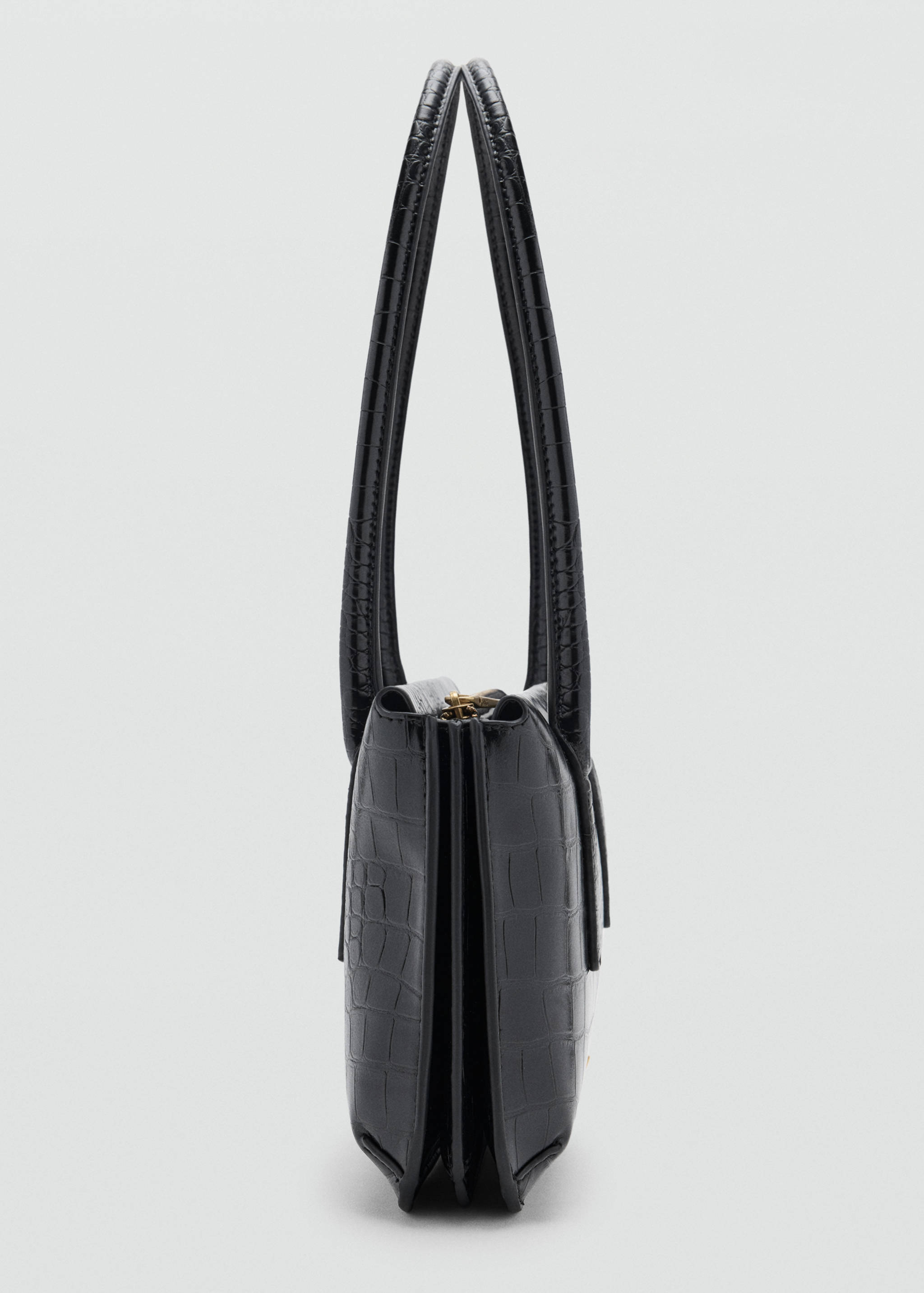 Black crocodile-effect shoulder bag, side view showing multi-compartment gusset