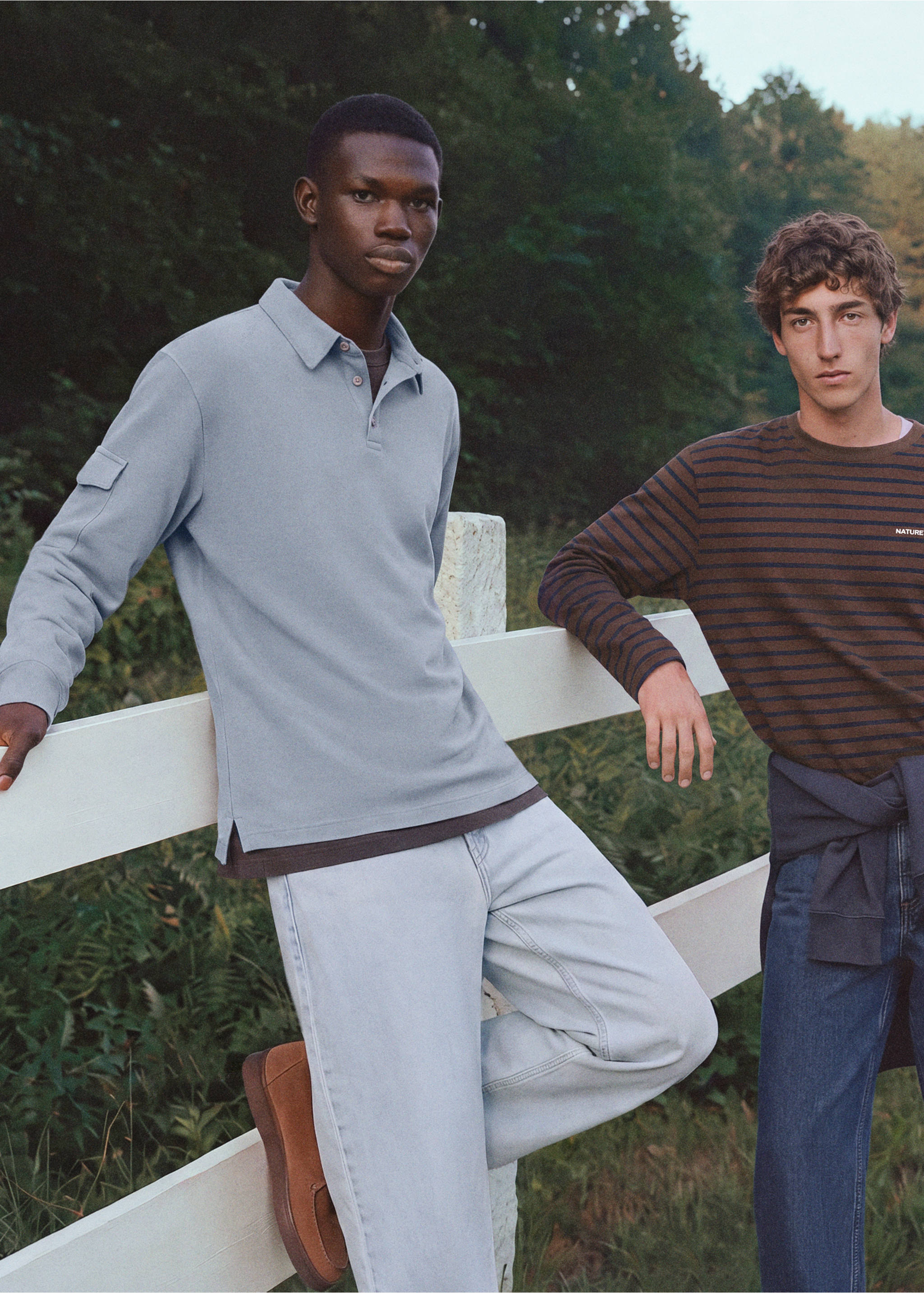 Light blue long-sleeved polo shirt with a sleeve pocket, worn with light denim trousers., Sky Blue. Ref: 37047799-00.
