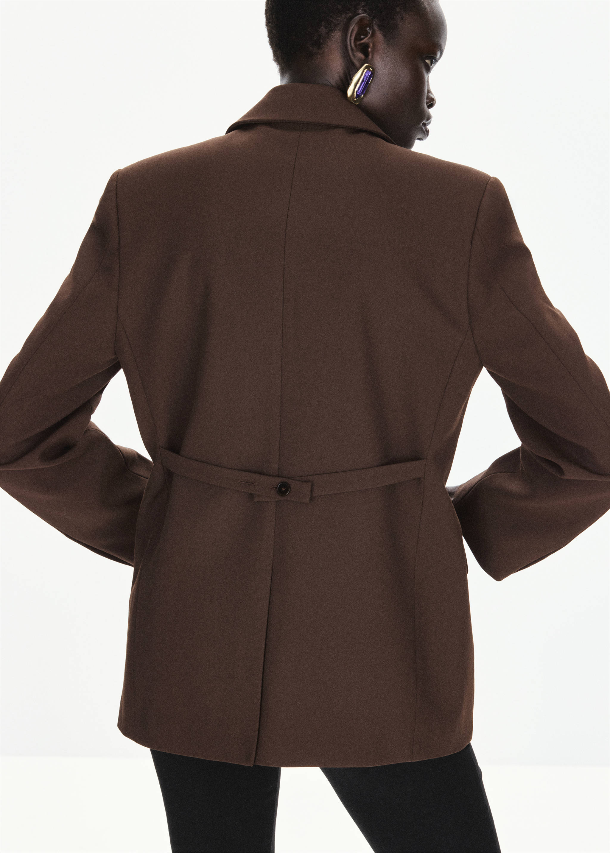 Dark brown blazer featuring a notched lapel and back half-belt, back view.