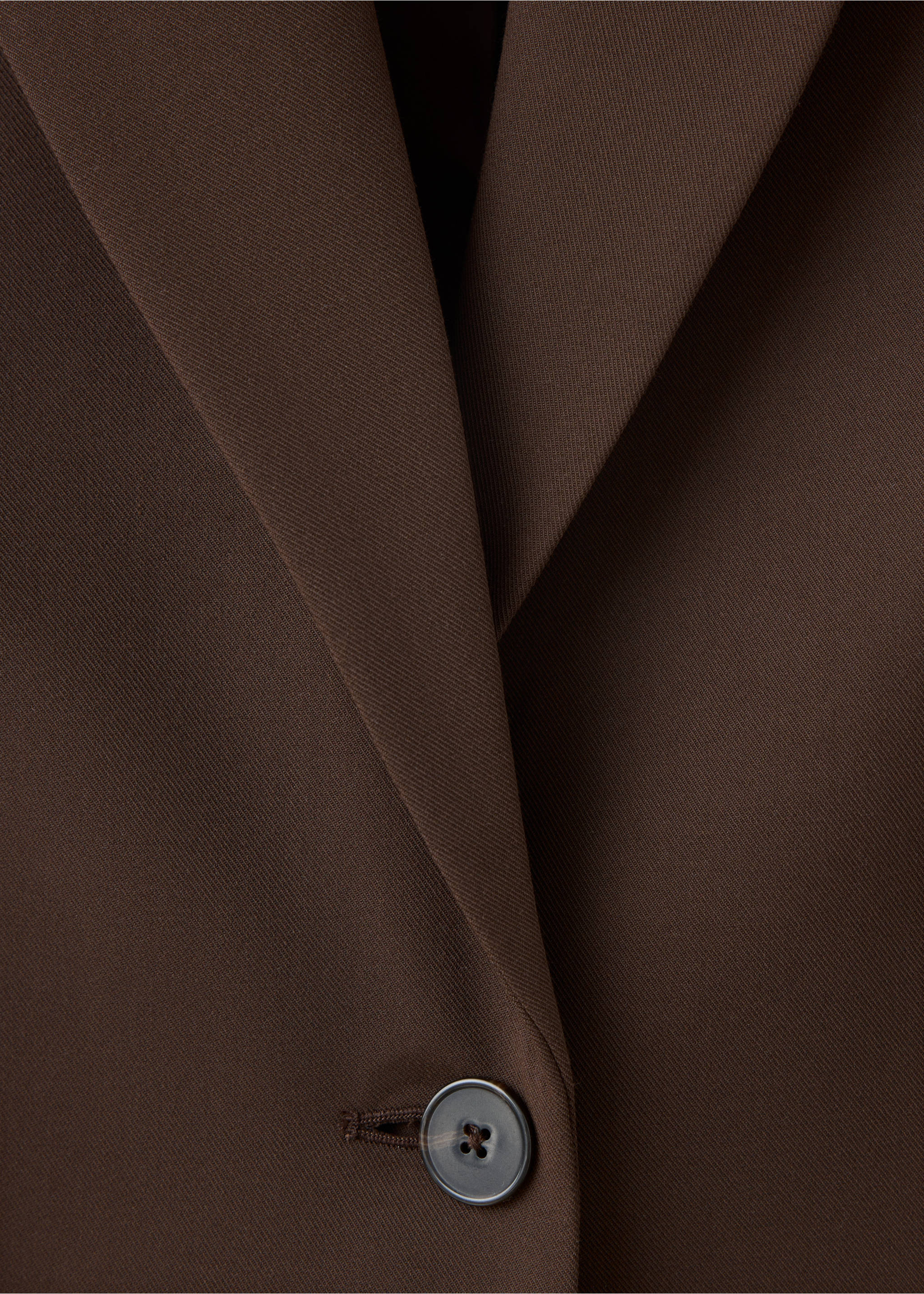 Brown blazer detail showing lapel and button closure., Brown. Ref: 37047806-00.