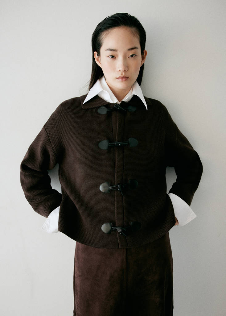 Knitted jacket with frog closures by Mango