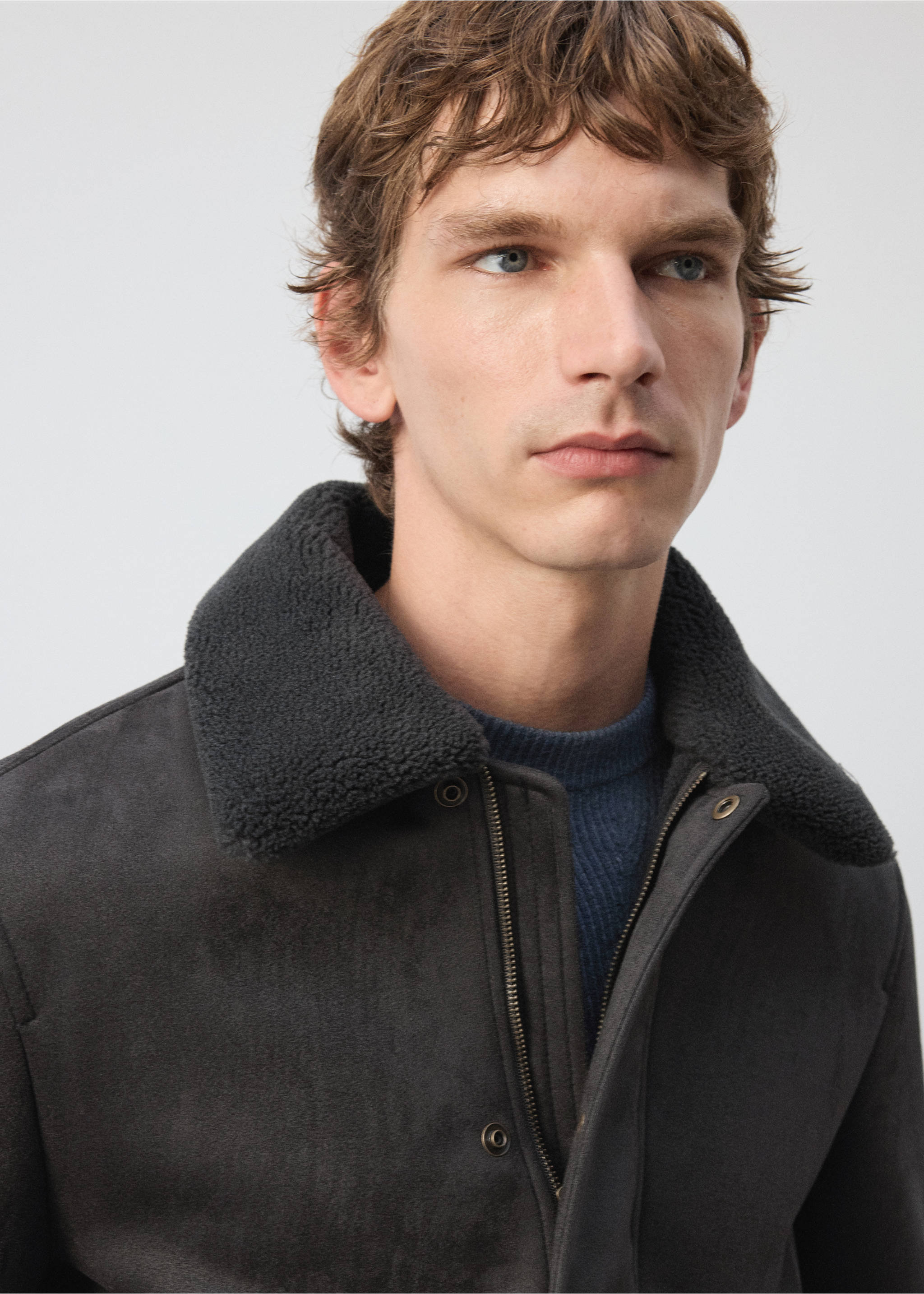 Close-up of a dark grey jacket with a faux-shearling collar., Dark Green. Ref: 37047889-00.